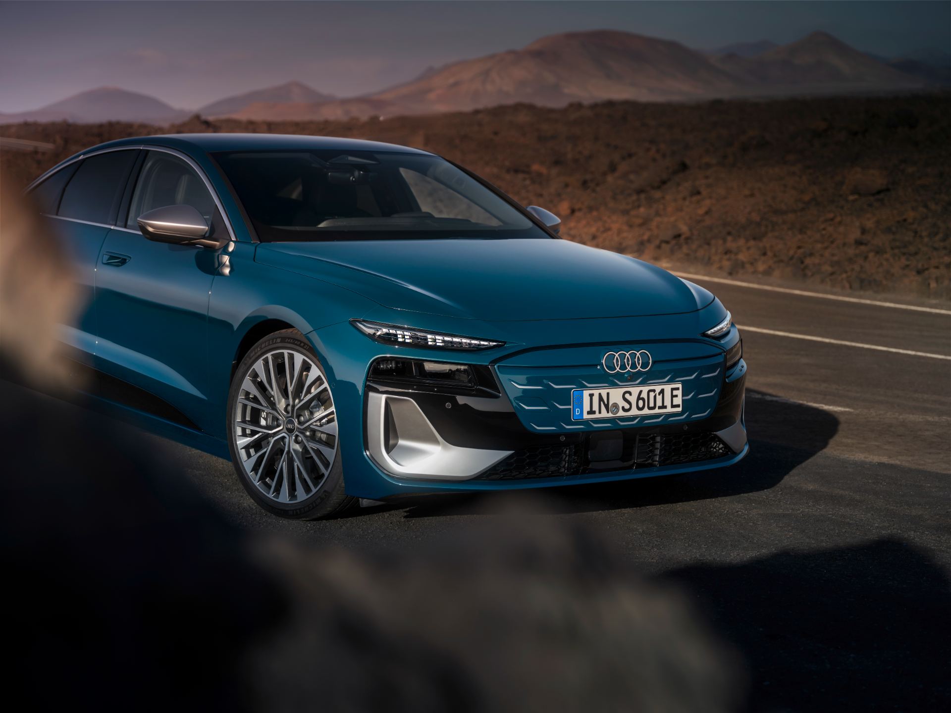 2026 audi s6 sportback e tron front three quarter close road teal