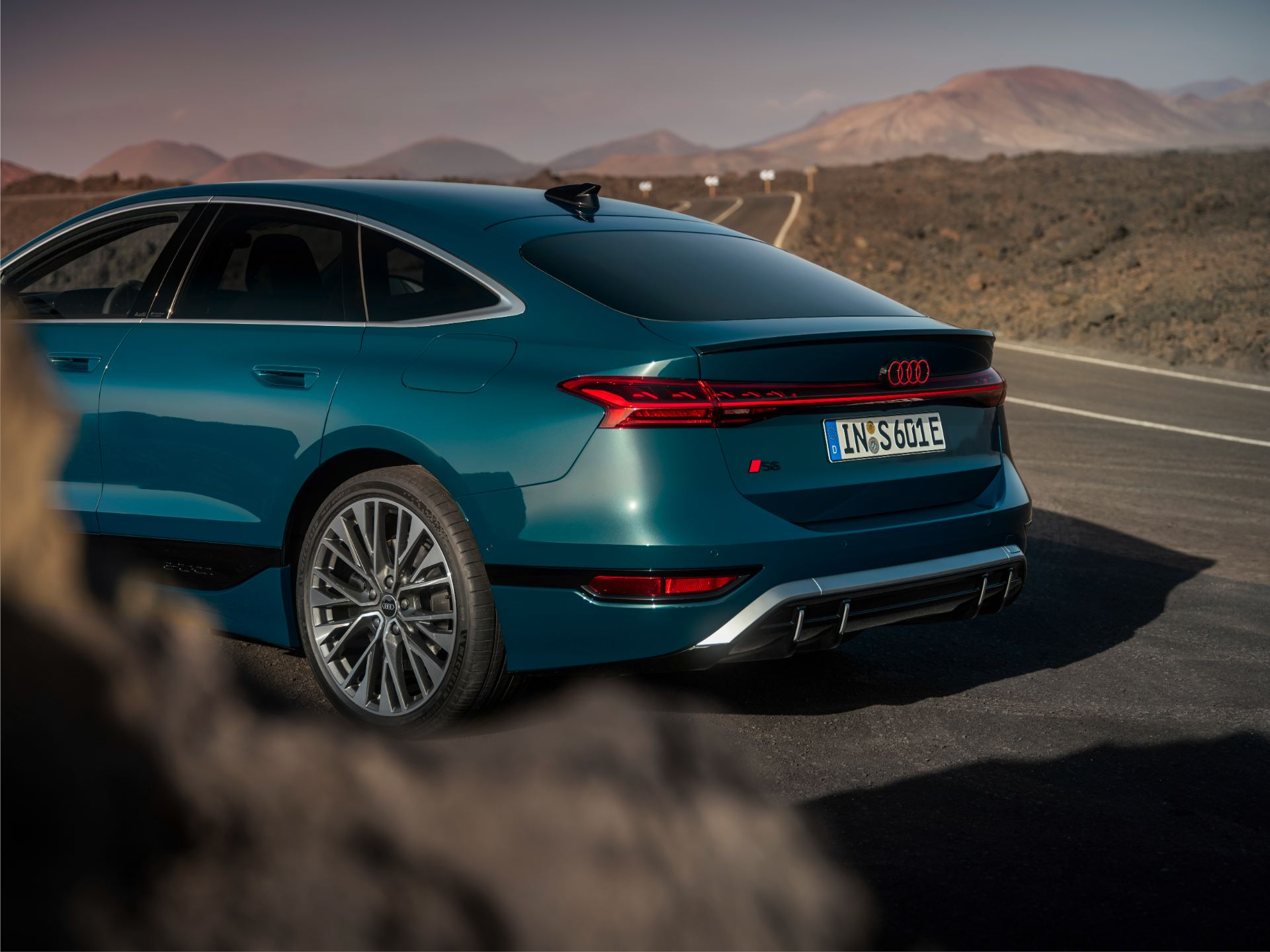 2026 audi s6 sportback e tron rear quarter volcanic road teal