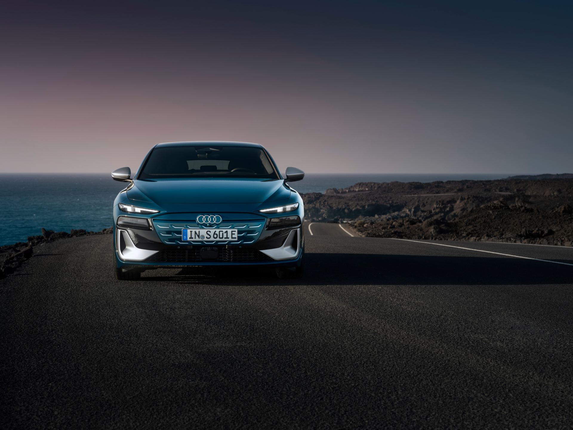 2026 audi s6 sportback e tron front coastal road dusk teal