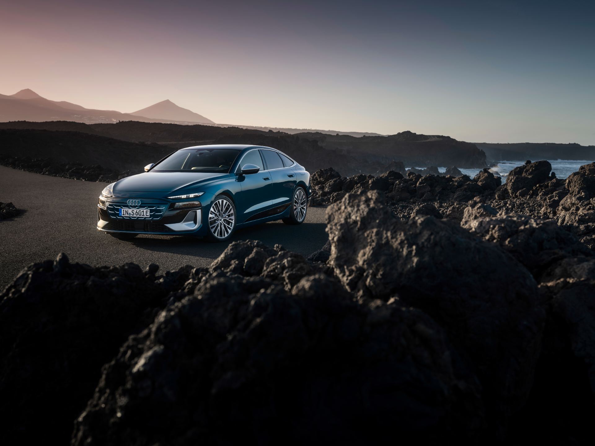 2026 audi s6 sportback e tron front three quarter volcanic rocks teal