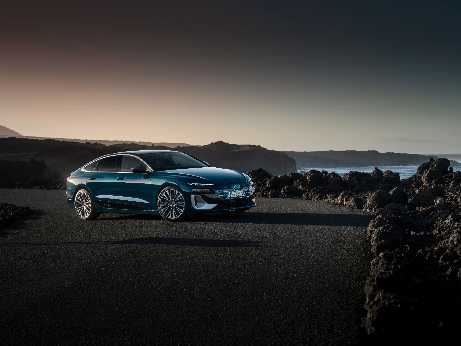 2026 audi s6 sportback e tron front three quarter volcanic coast teal