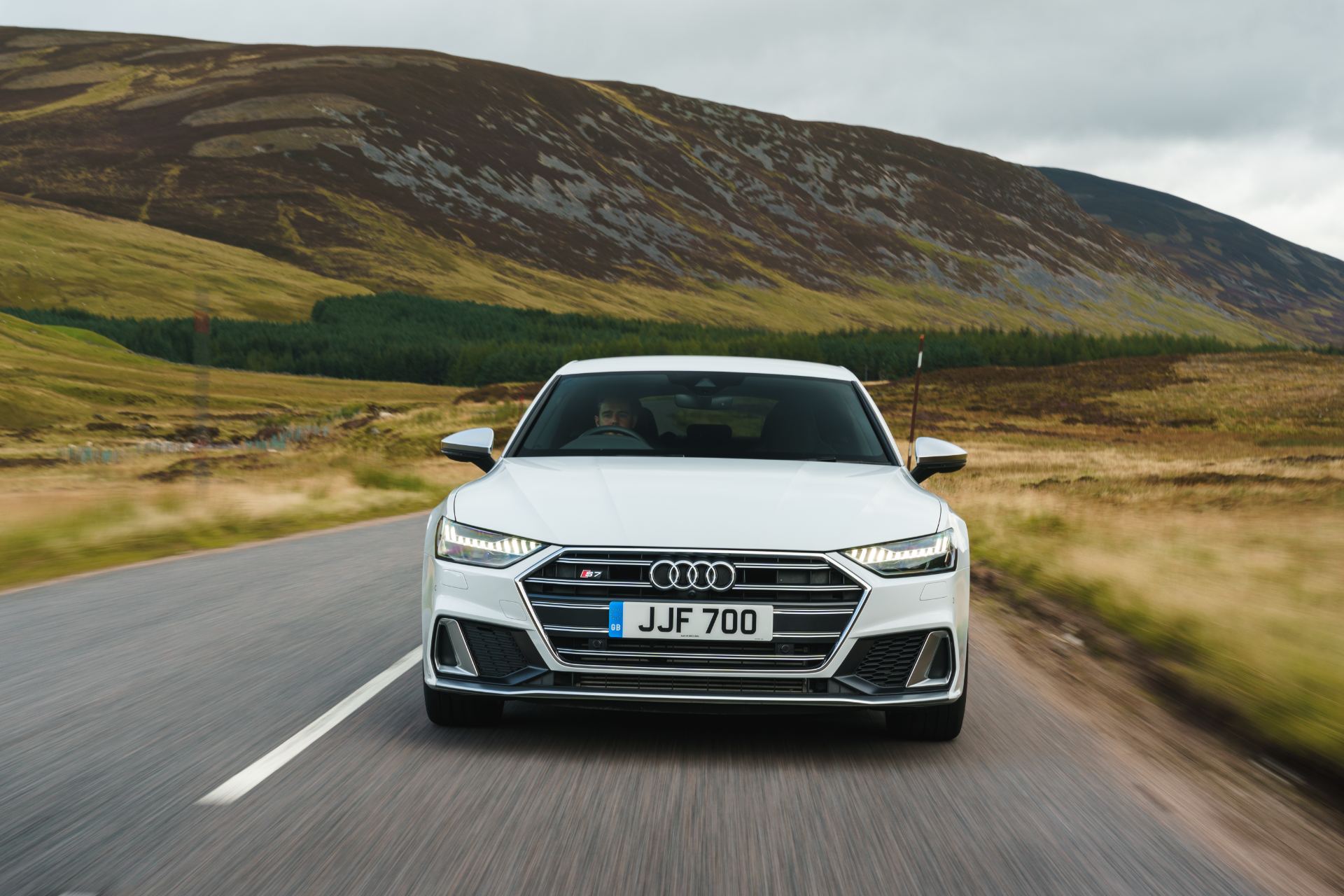 audi s7 sportback driving front glen road white