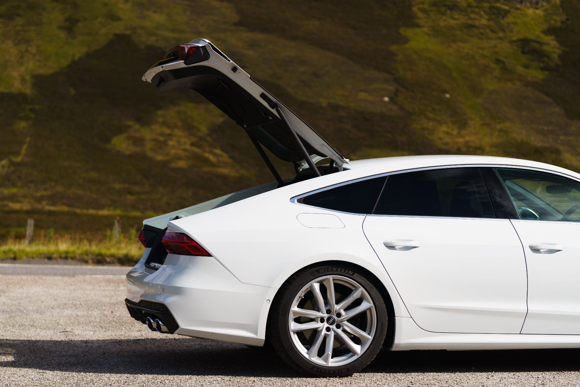 audi s7 sportback tailgate open side view white