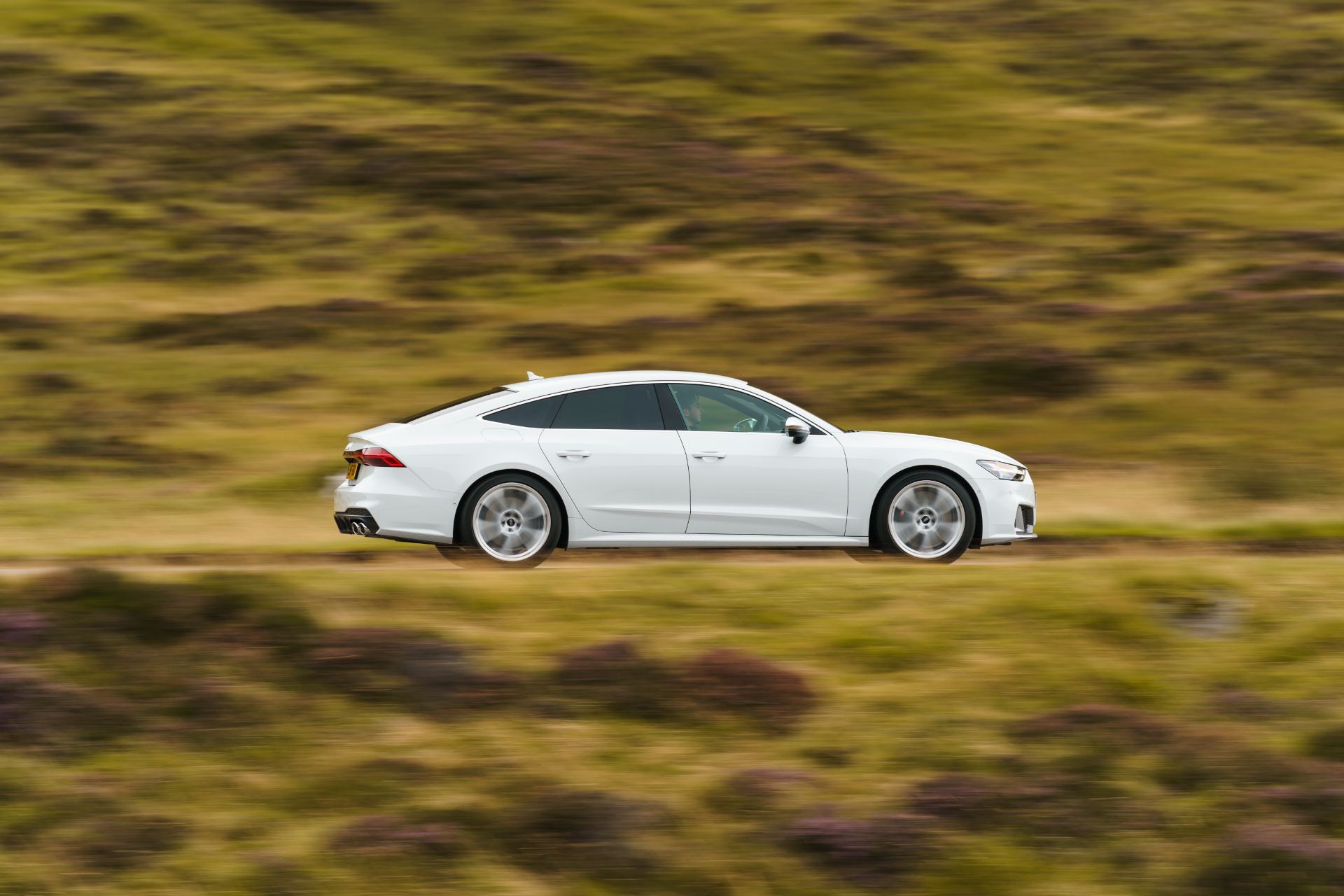audi s7 sportback driving side profile heather white