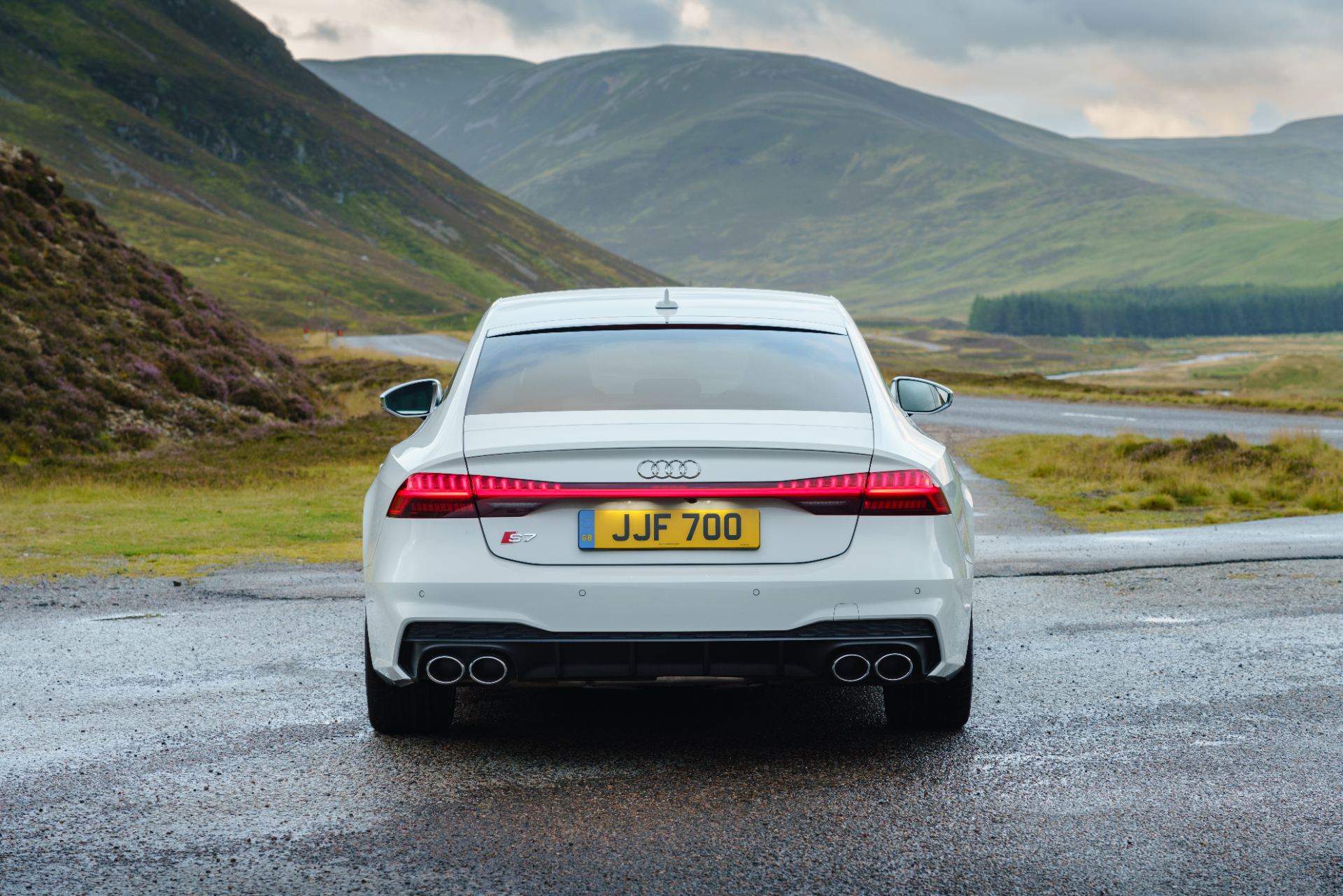 audi s7 sportback rear wet tarmac white
