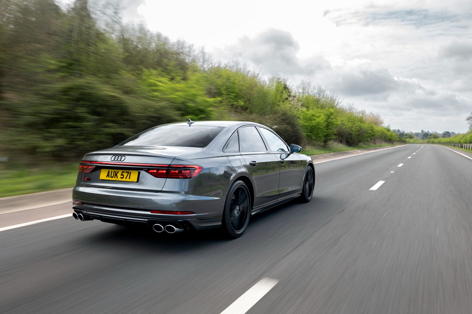 2025 audi s8 driving rear highway grey