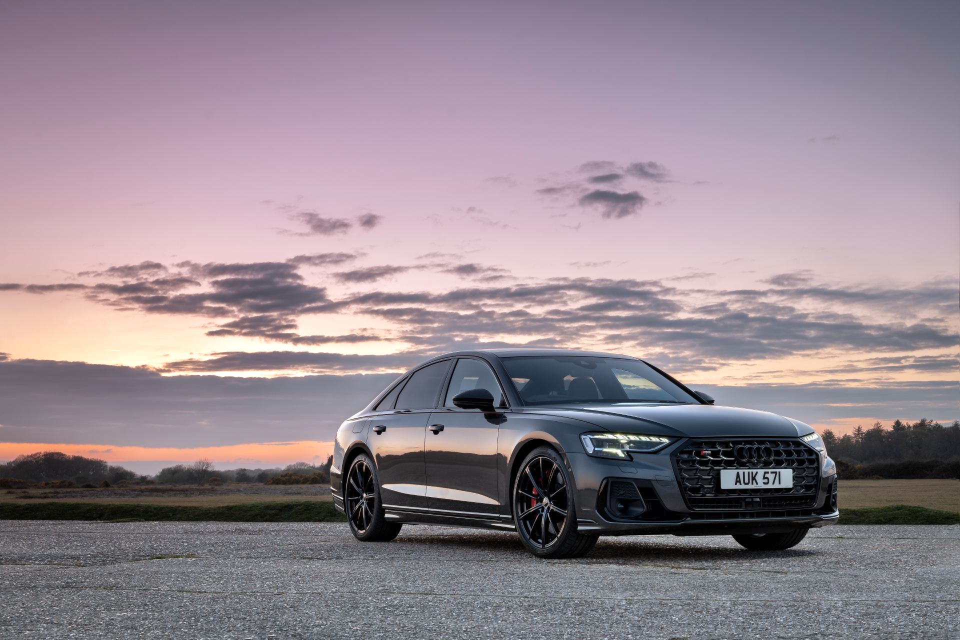 2025 audi s8 front three quarter pink sky grey