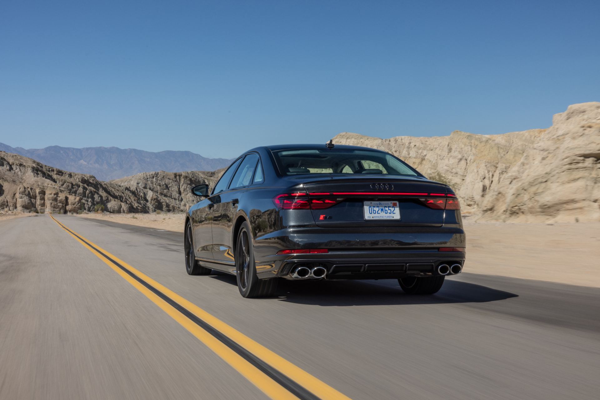 2026 audi s8 driving rear desert road black