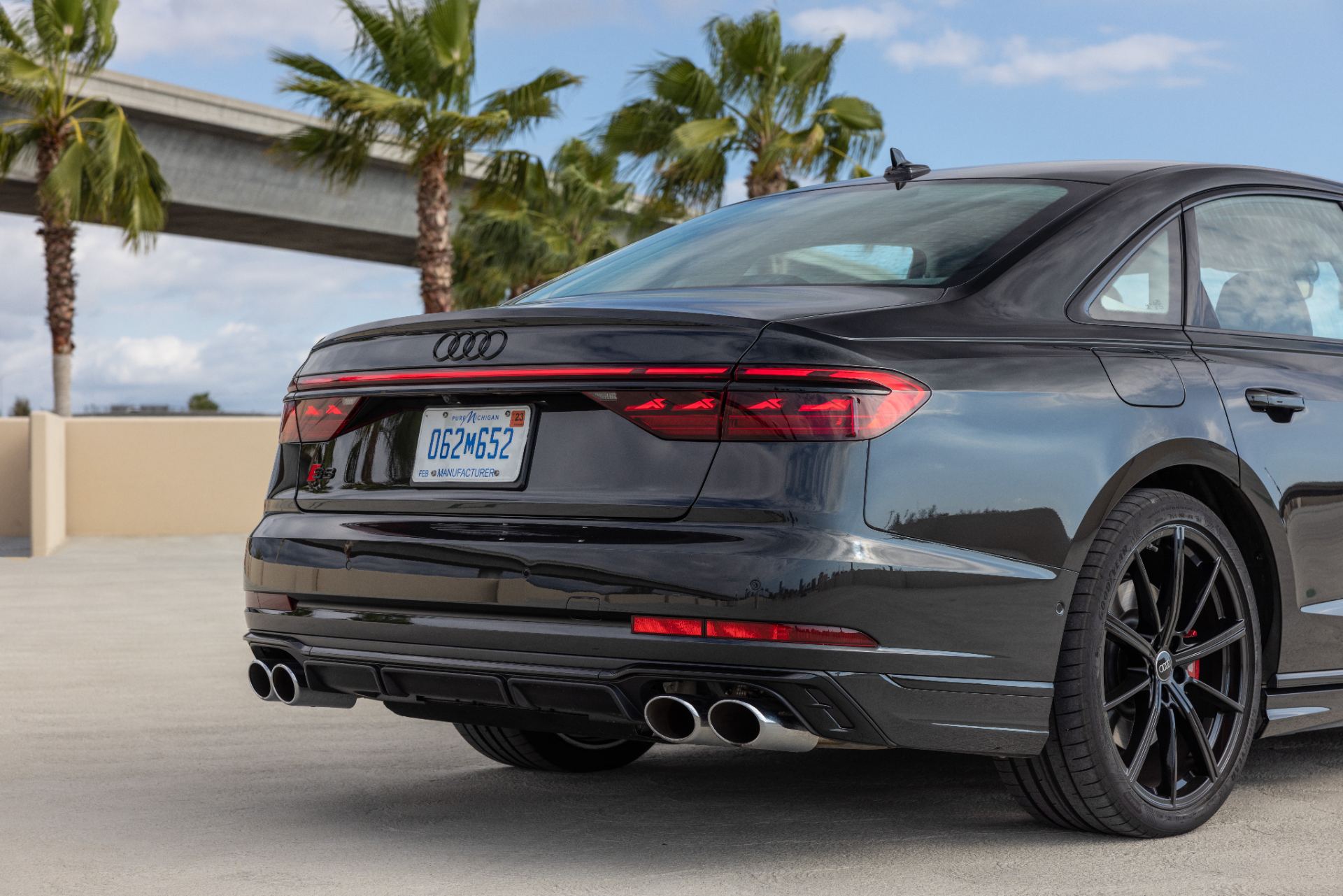 2026 audi s8 rear three quarter palm trees black