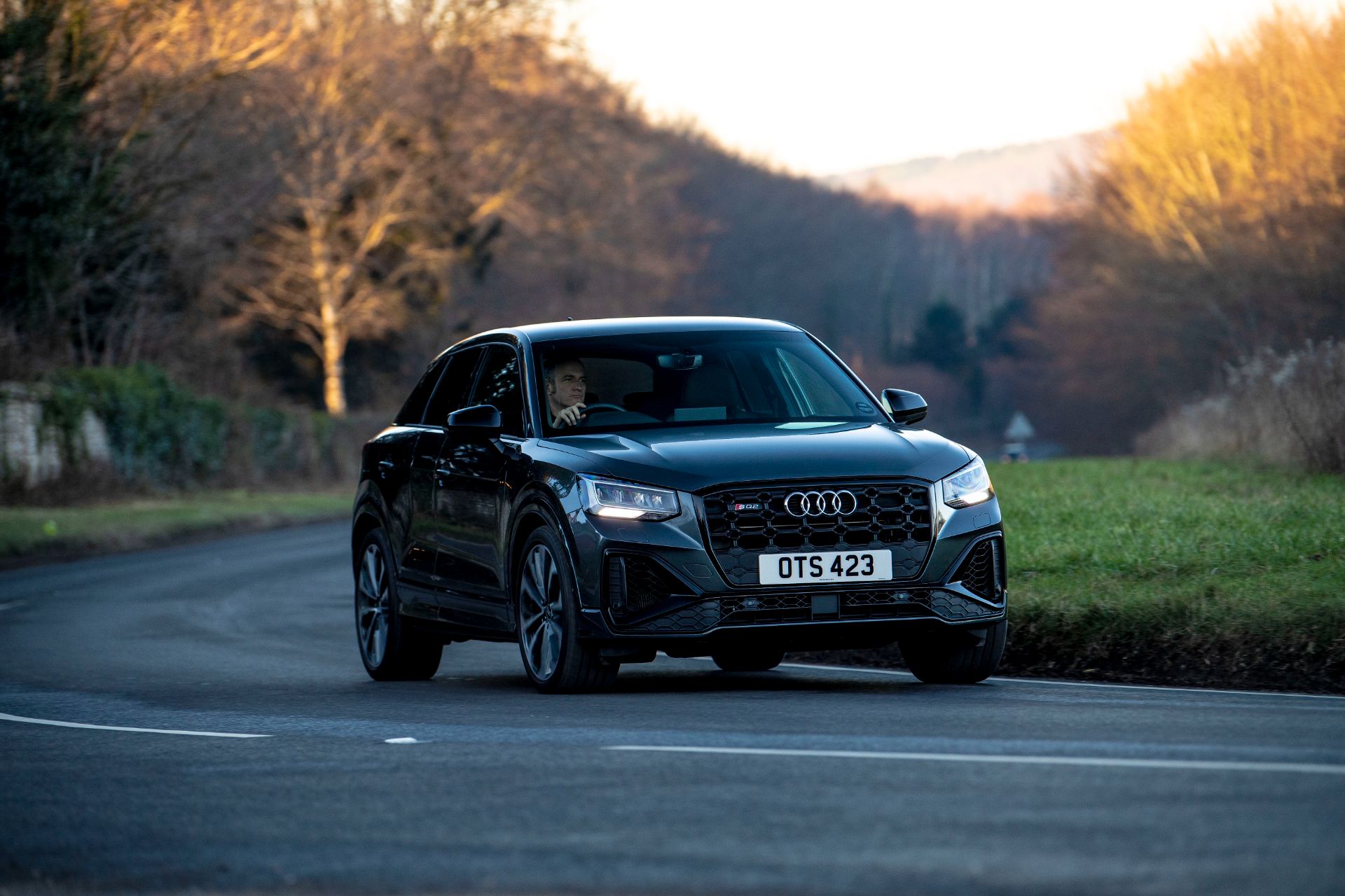 2025 audi sq2 driving front autumn road grey
