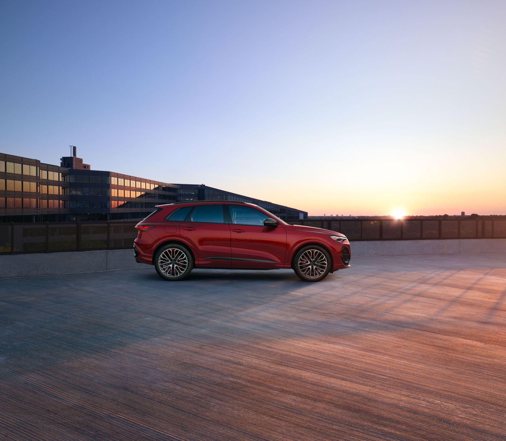 2026 audi sq5 side profile quay sunset red