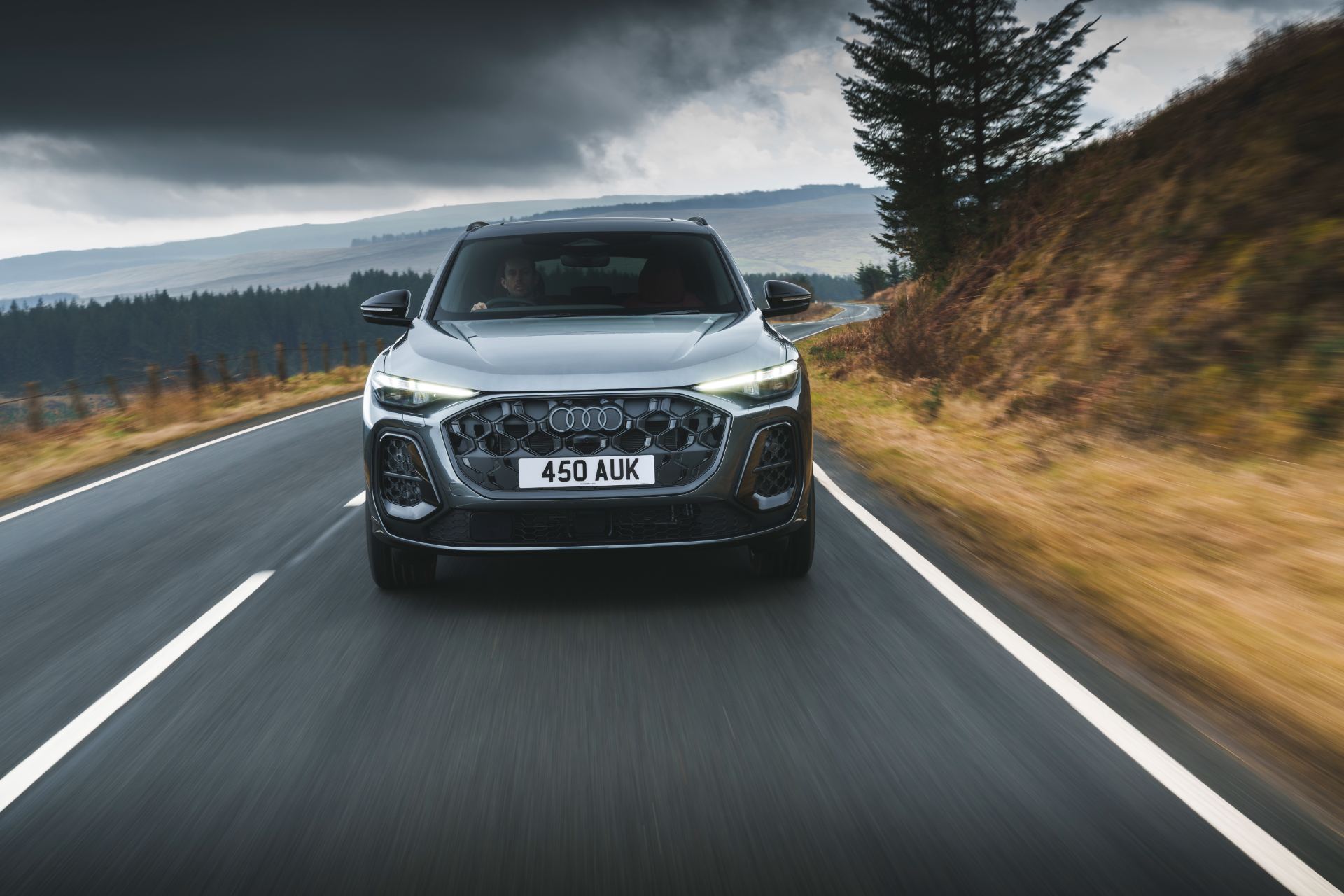 2026 audi sq5 driving front grey