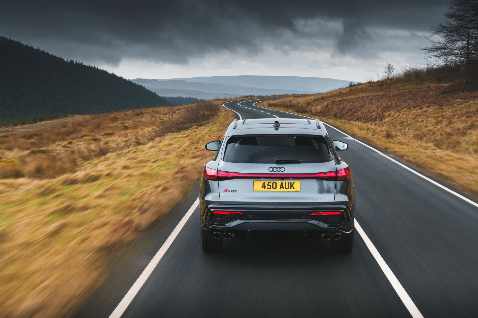 2026 audi sq5 driving rear grey
