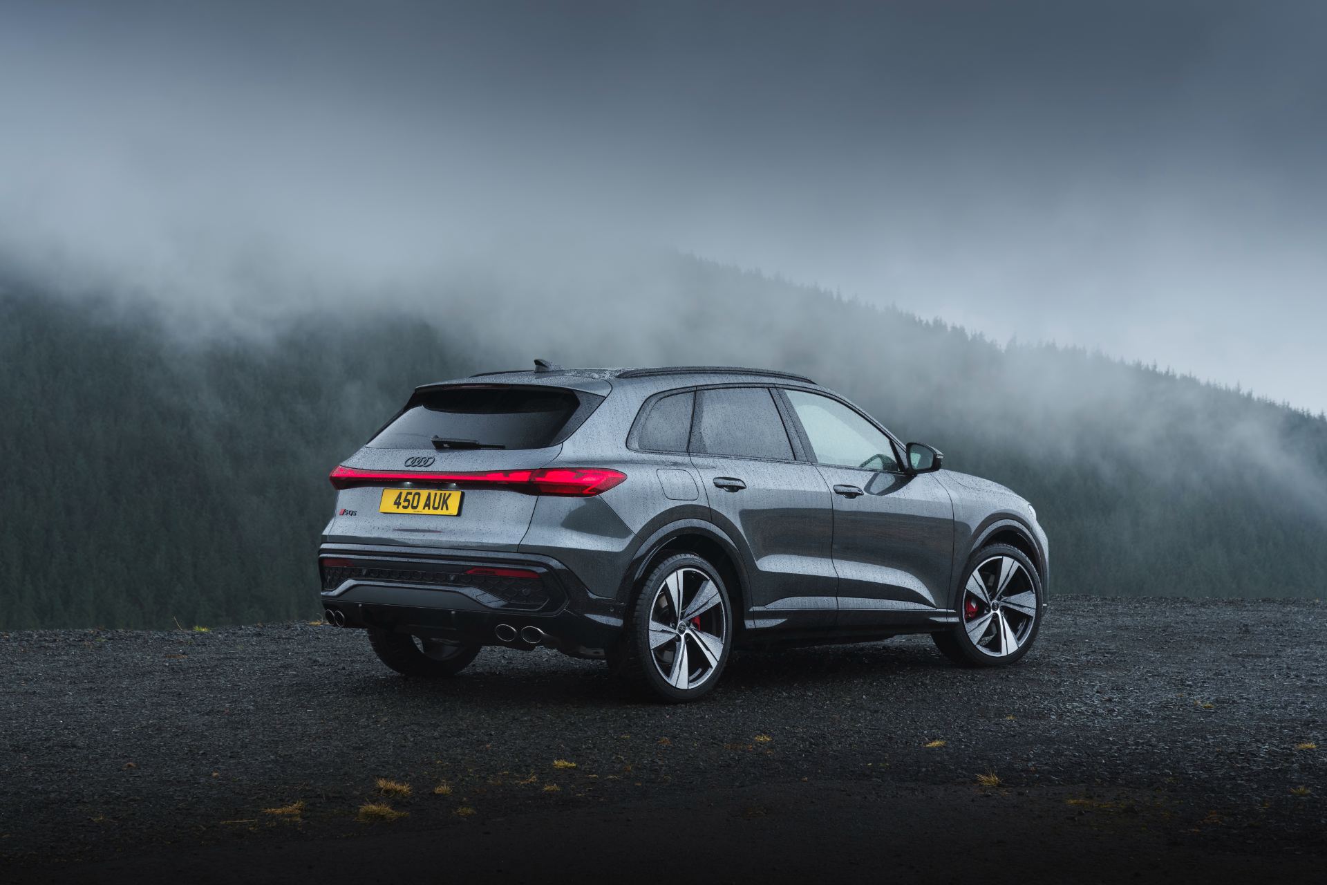 2026 audi sq5 rear three quarter low angle fog grey