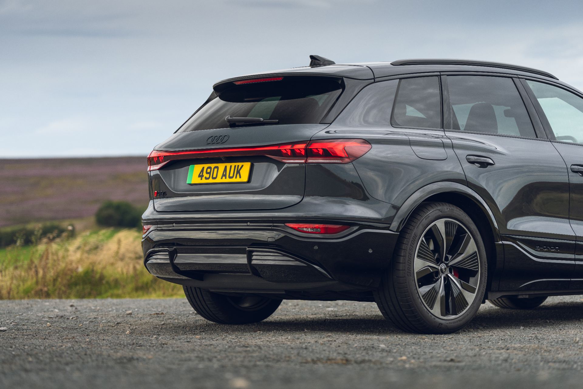 2026 audi sq6 e tron rear three quarter close up grey