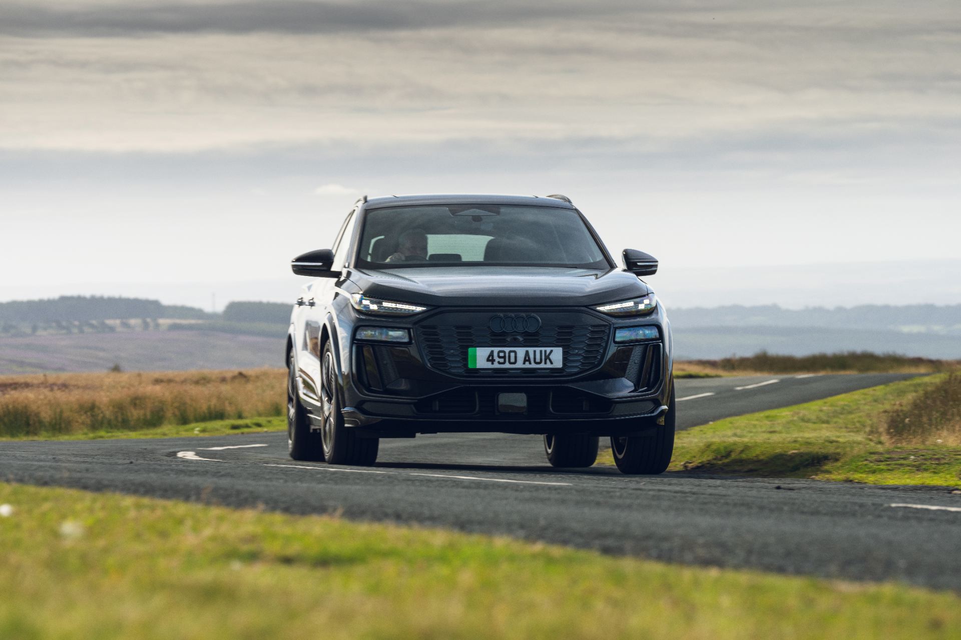 2026 audi sq6 e tron driving front grey