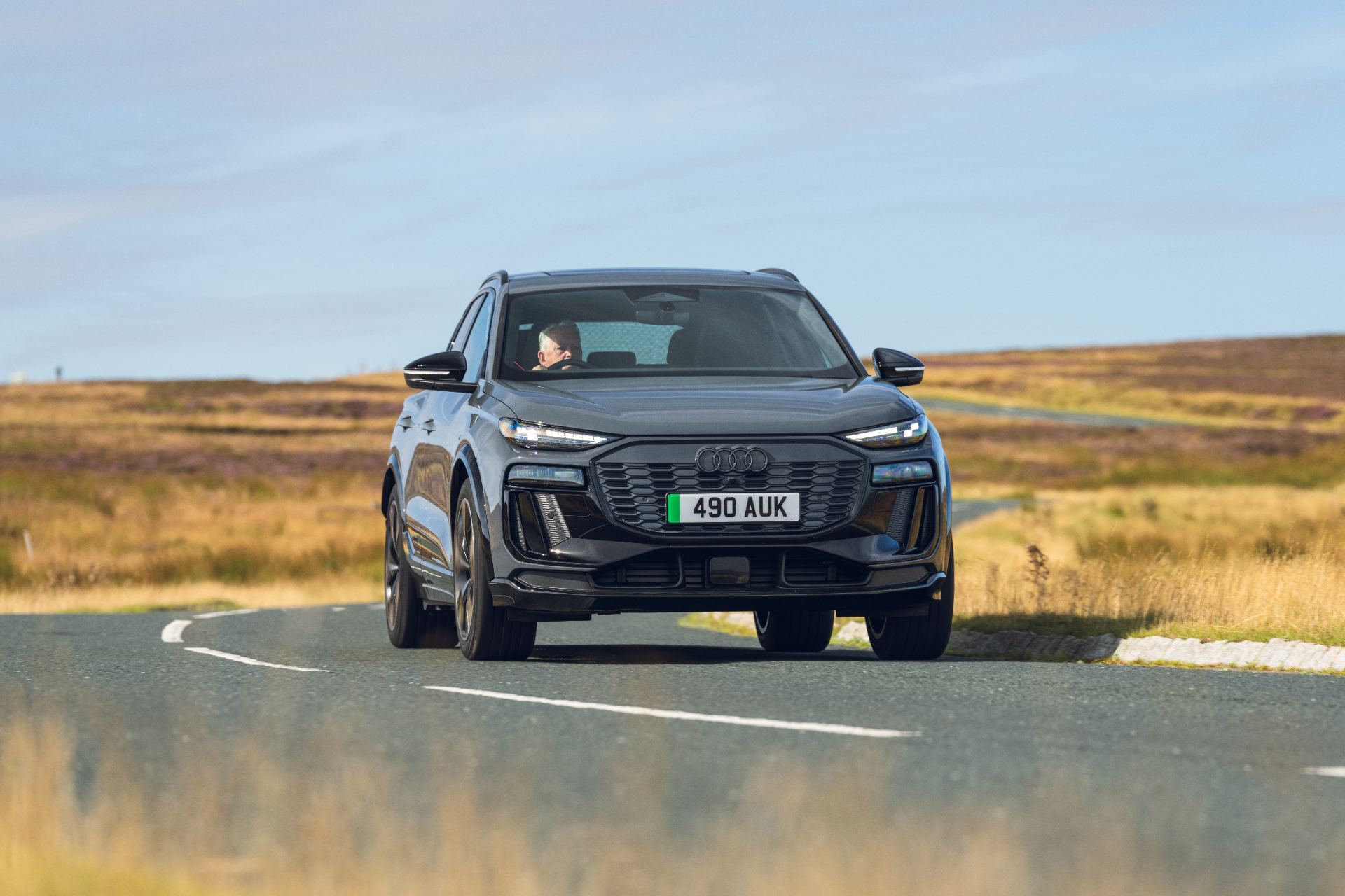 2026 audi sq6 e tron driving front bend grey