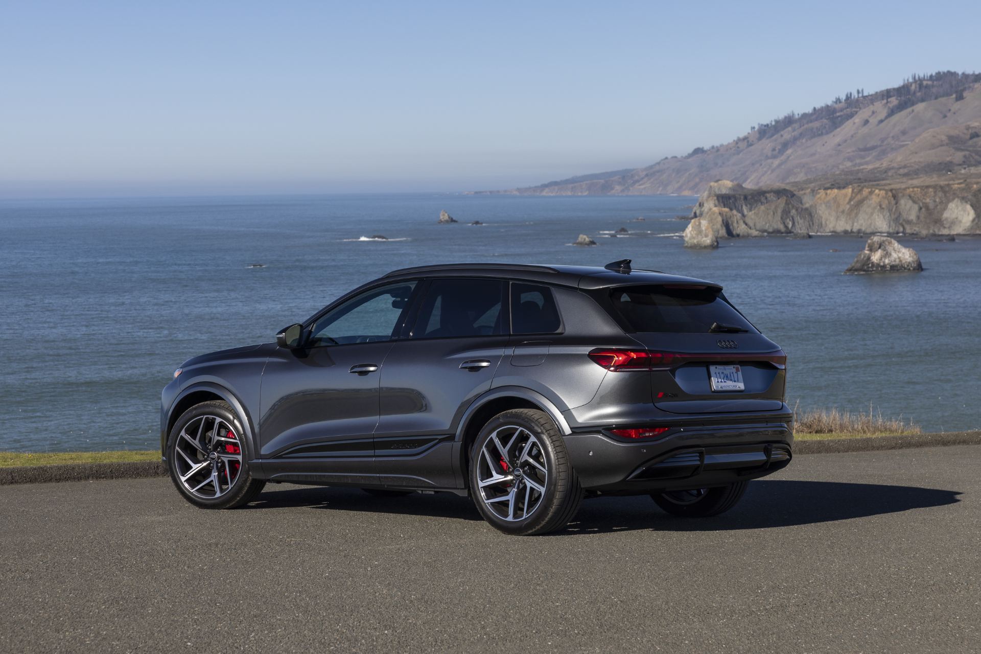 2027 audi sq6 e tron rear three quarter coast grey