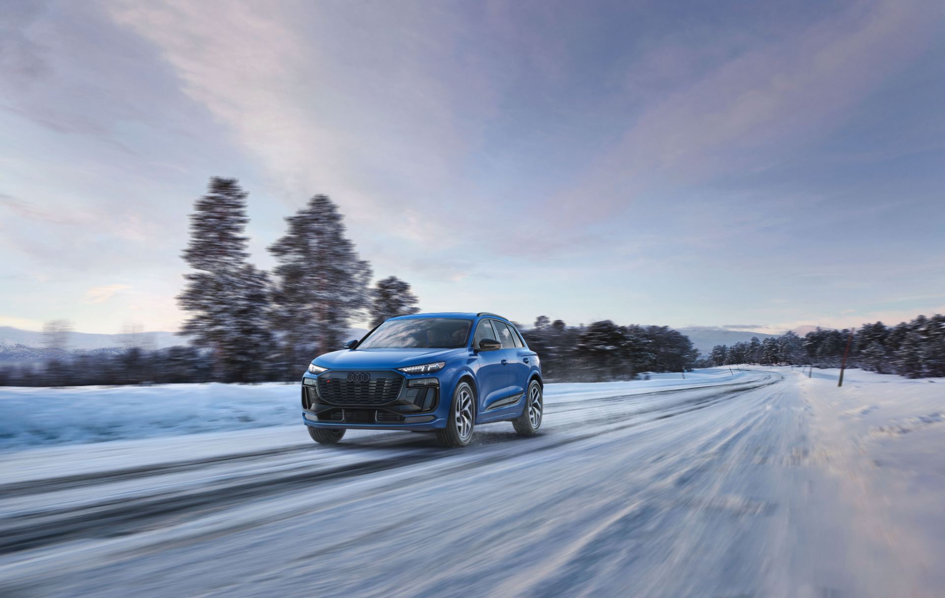 2027 audi sq6 e tron driving front snowy road blue