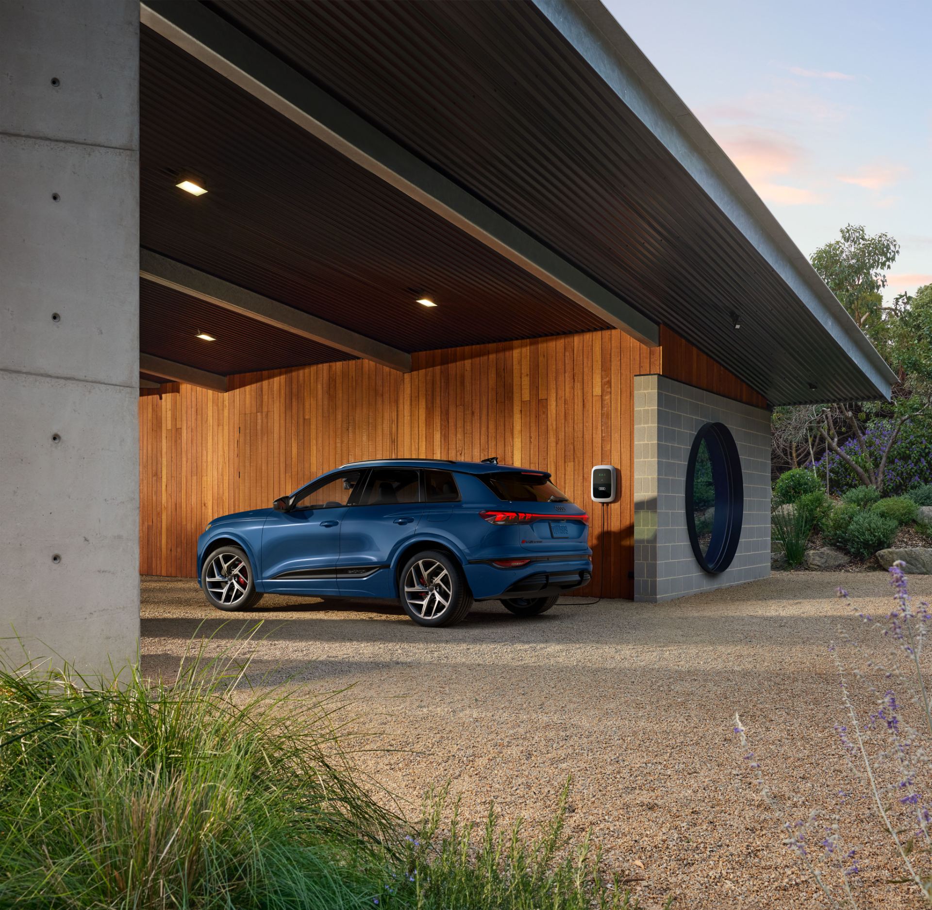 2027 audi sq6 e tron rear three quarter carport blue