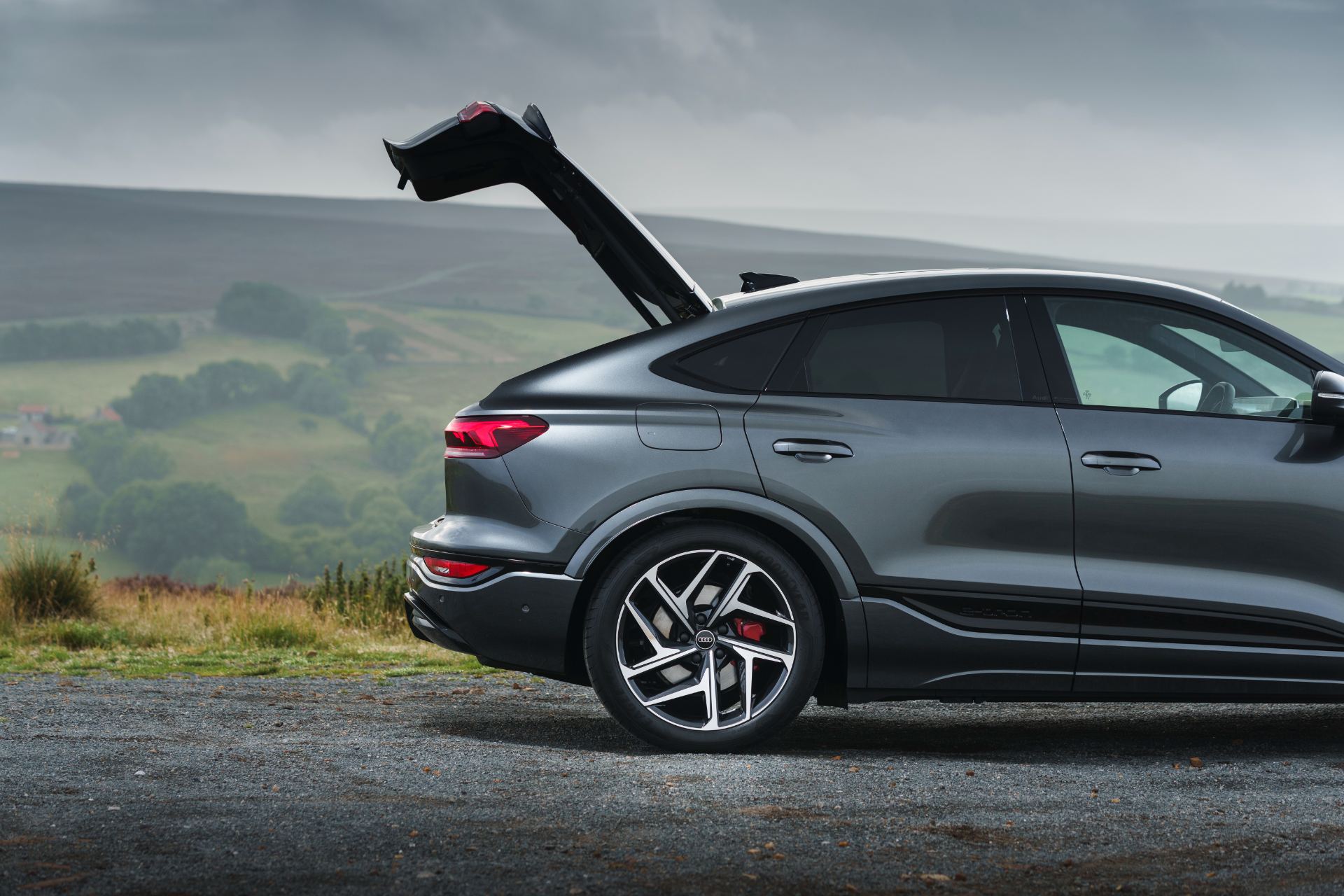 2026 audi sq6 sportback e tron tailgate open grey