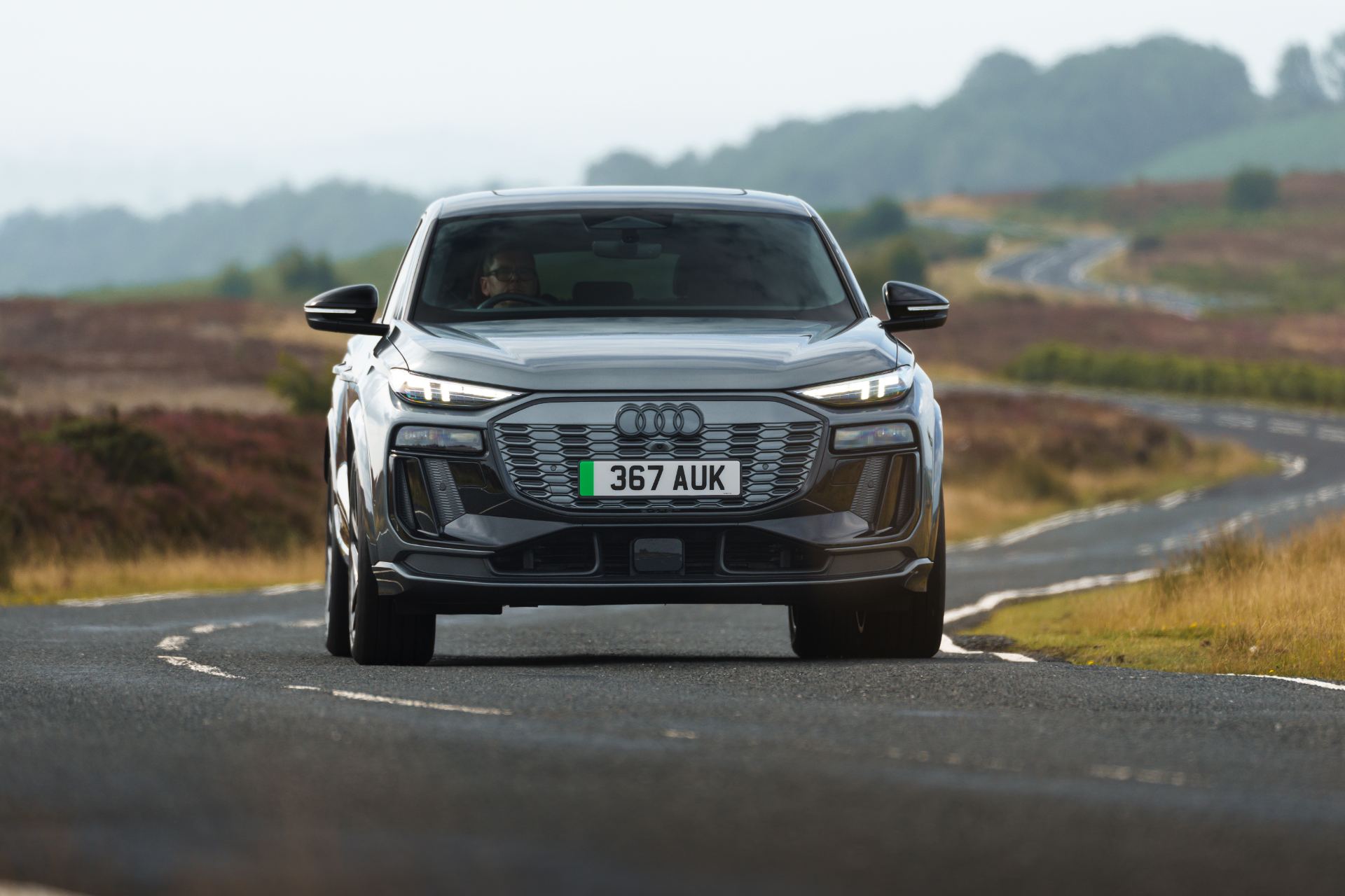 2026 audi sq6 sportback e tron driving front grey
