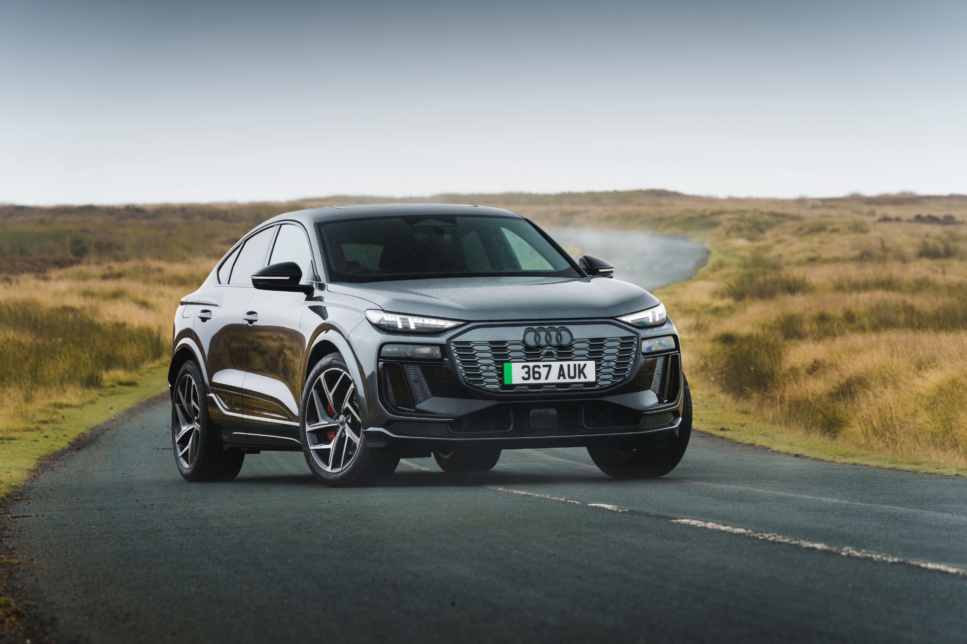2026 audi sq6 sportback e tron front three quarter road grey