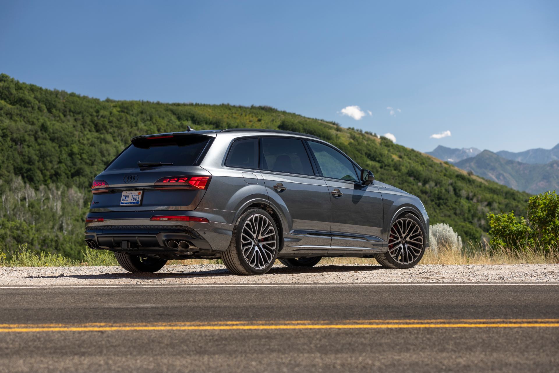 audi sq7 rear three quarter mountain road grey