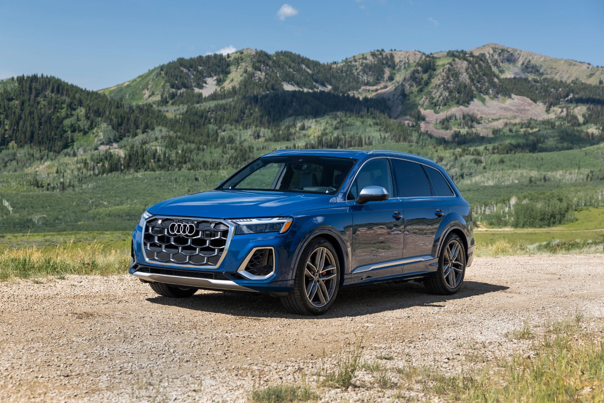 audi sq7 front three quarter mountain meadow blue