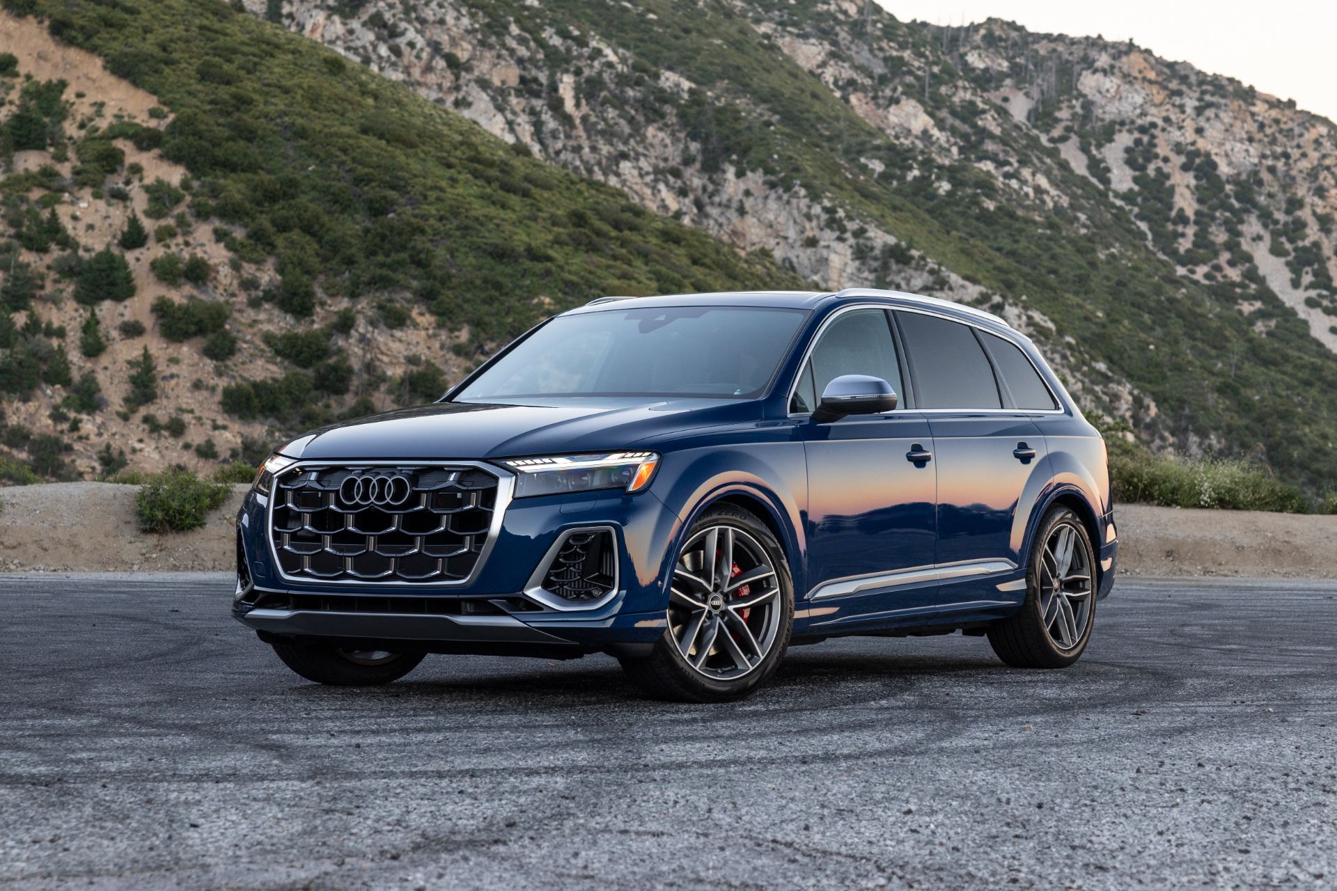 audi sq7 front three quarter low angle blue