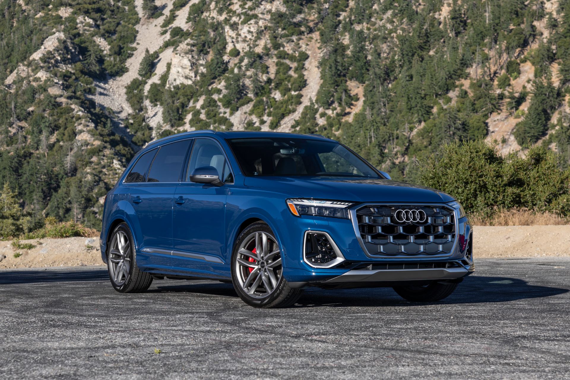 audi sq7 front three quarter mountain car park blue