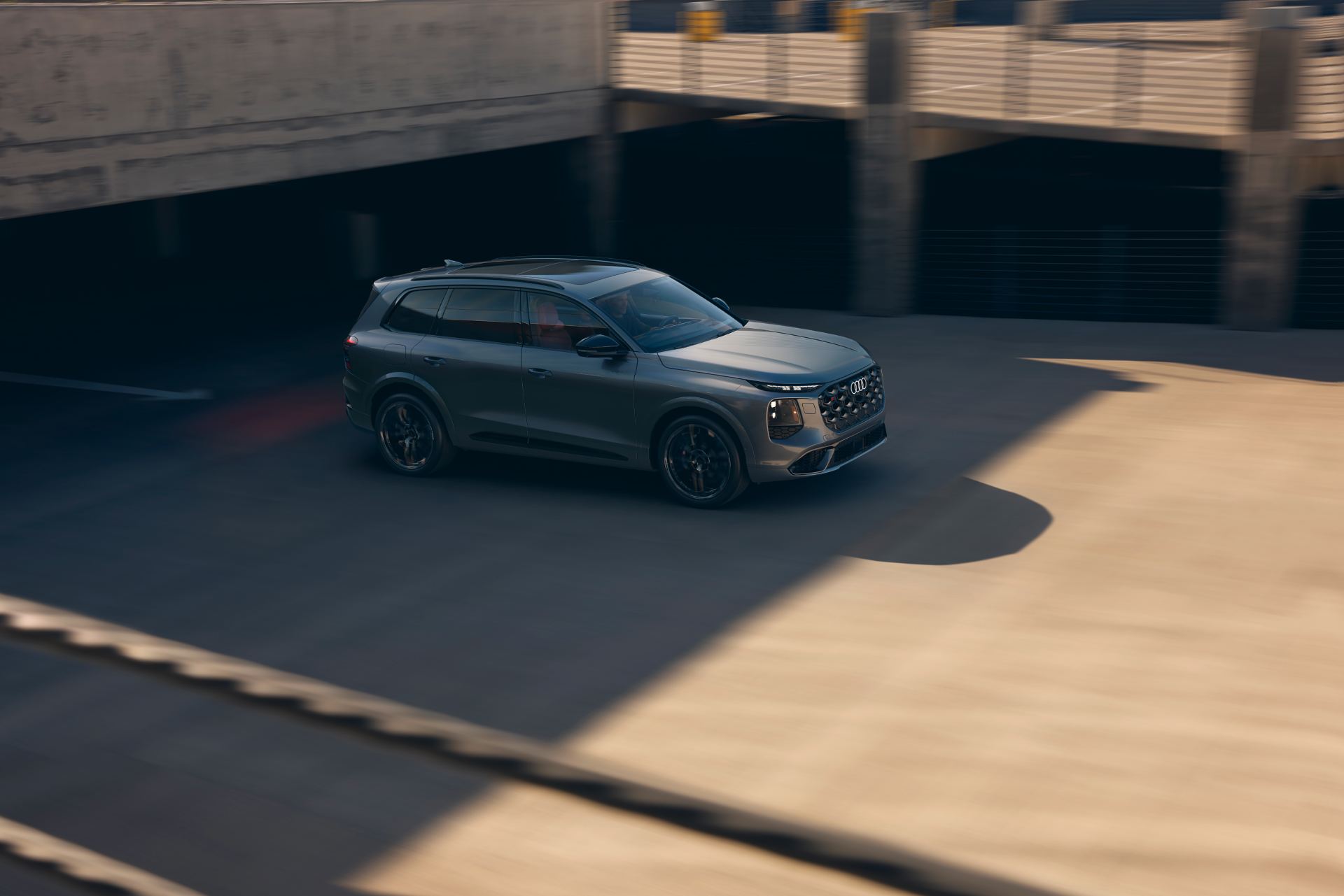 2027 audi sq7 driving parking deck grey