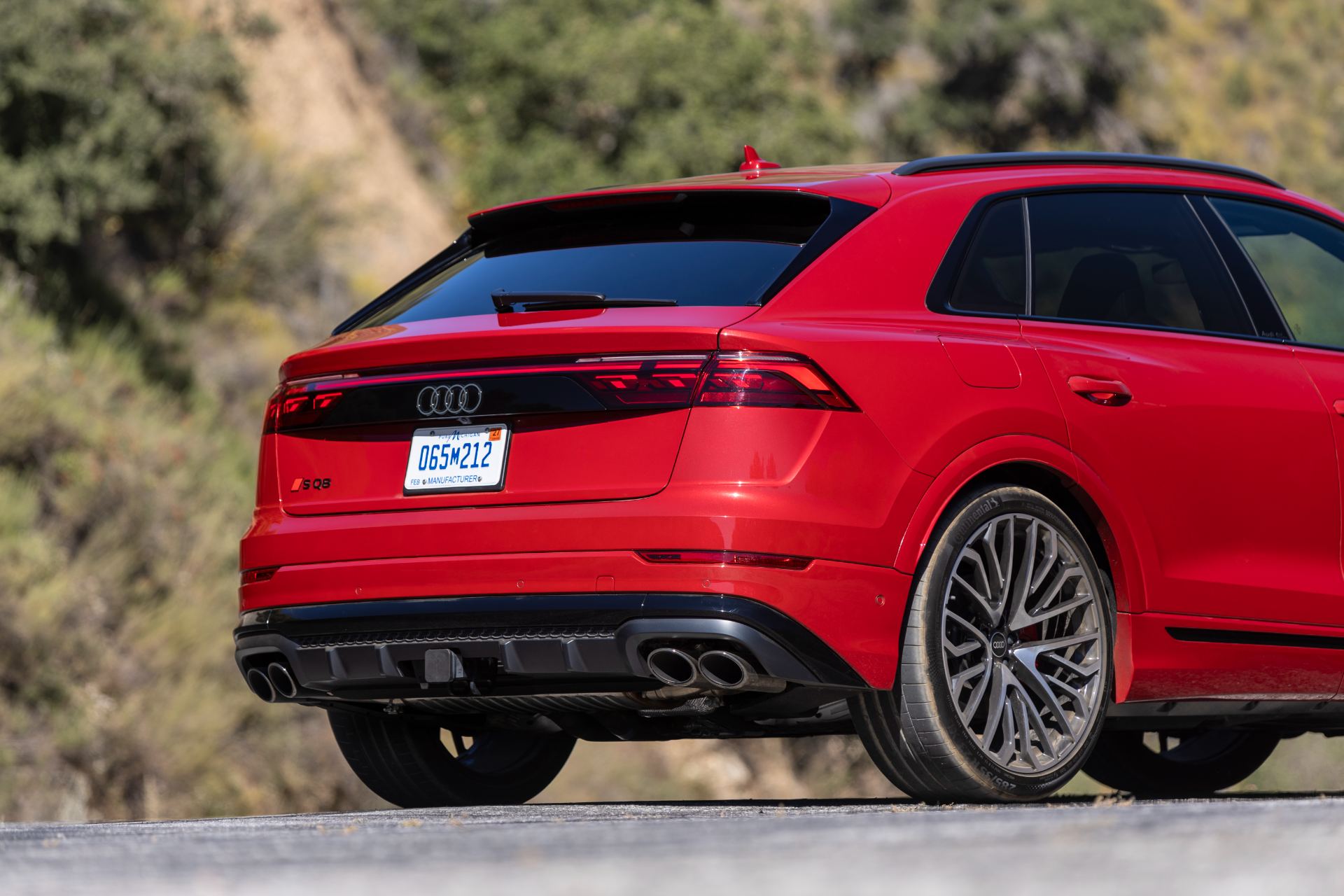 audi sq8 rear three quarter close red