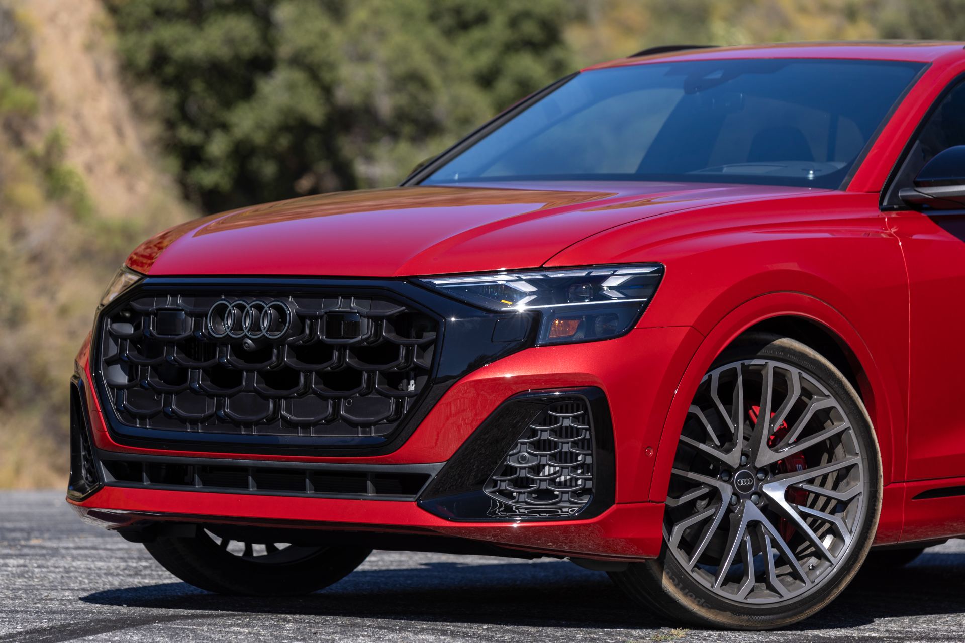 audi sq8 front three quarter close red