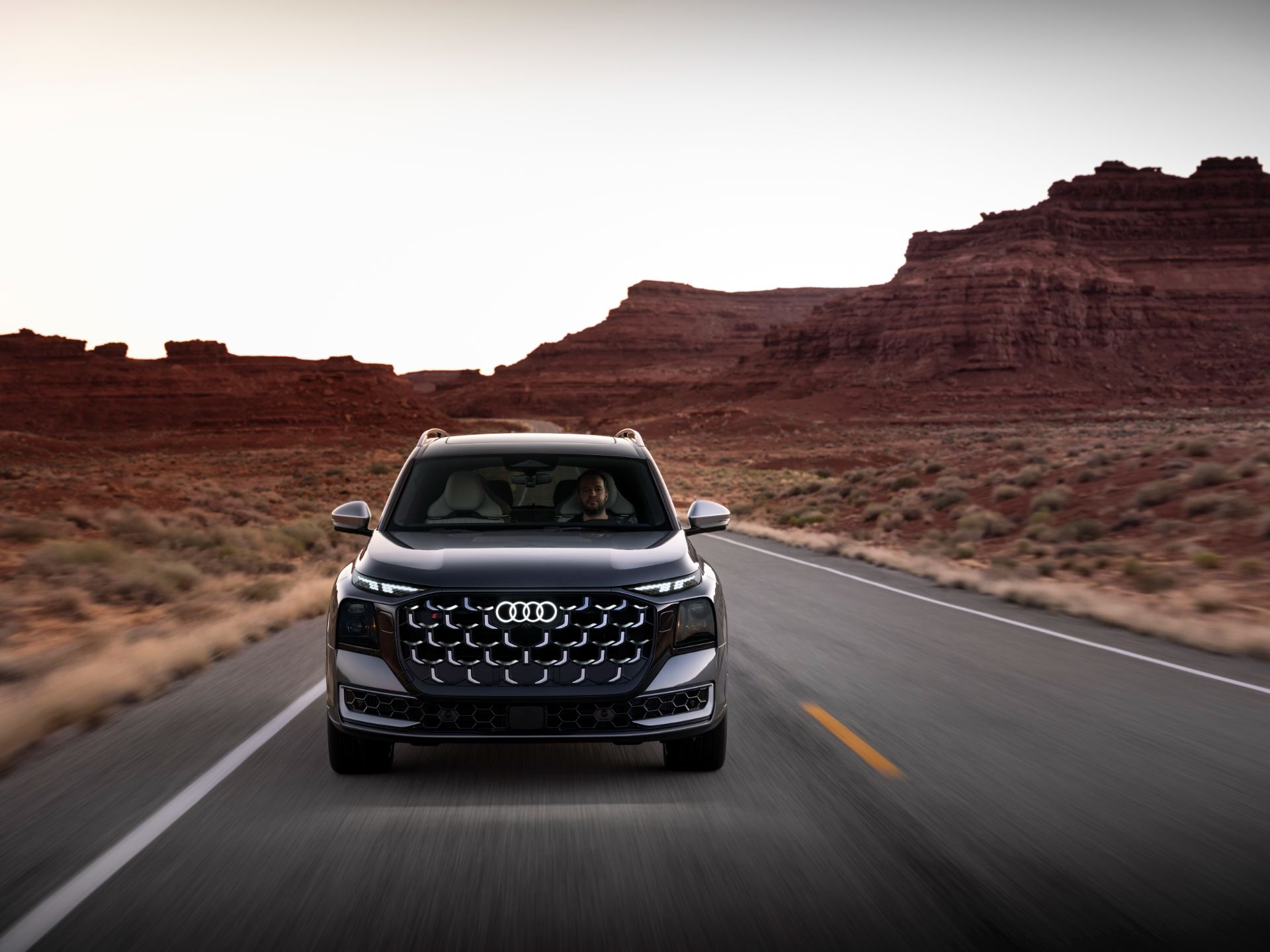 2027 audi sq9 driving front canyon grey