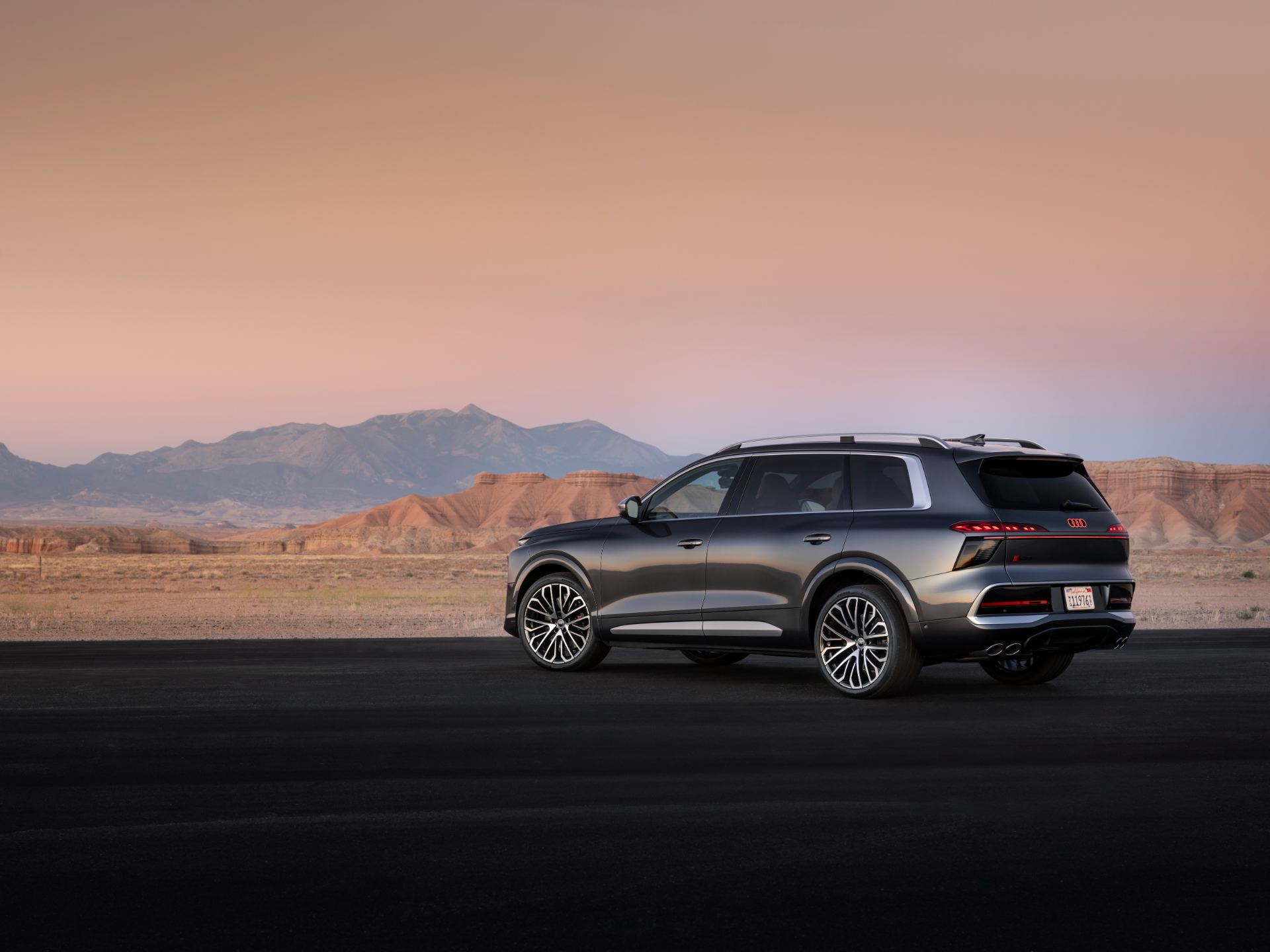 2027 audi sq9 rear three quarter desert grey