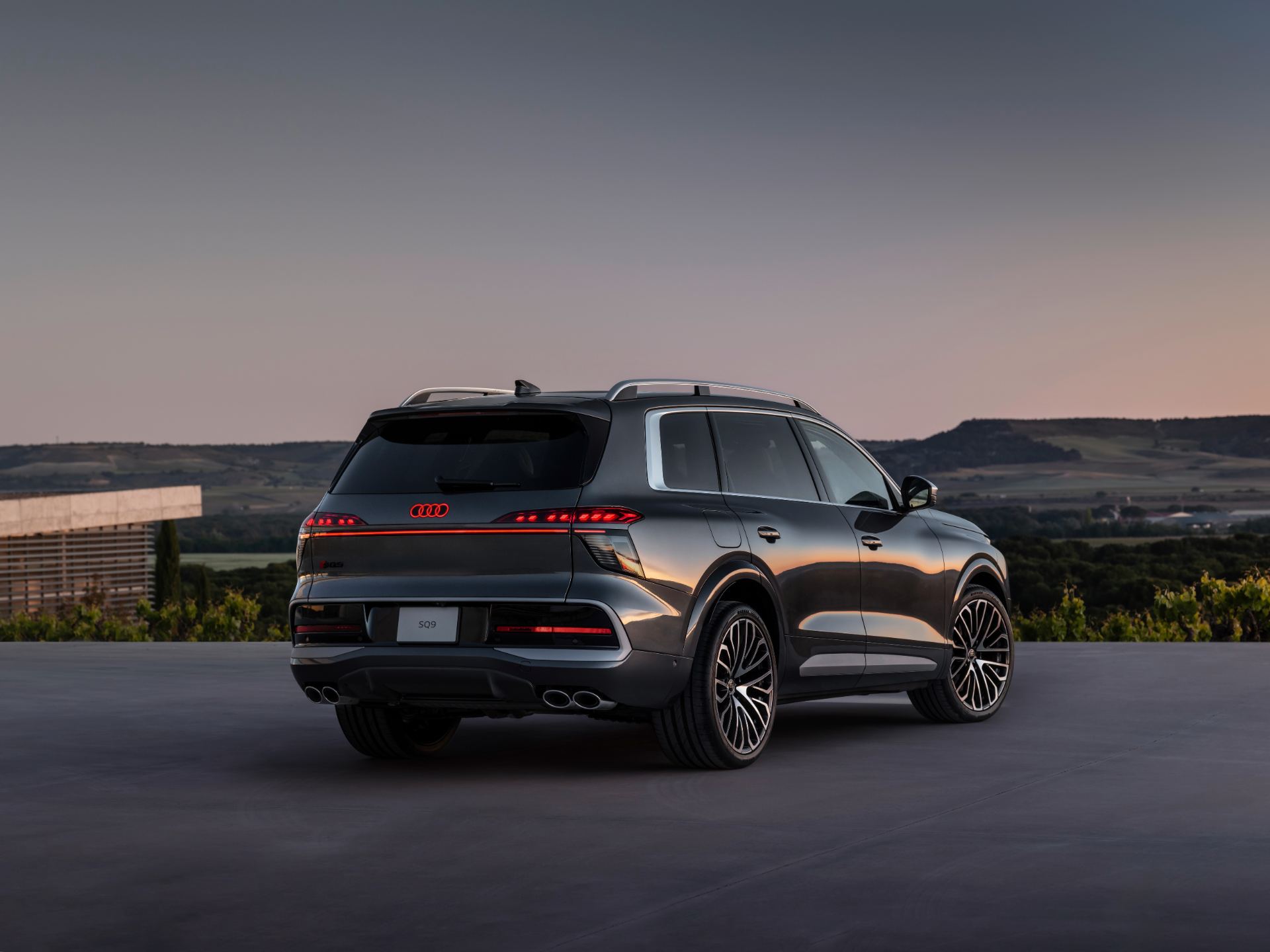 2027 audi sq9 rear three quarter vineyard grey