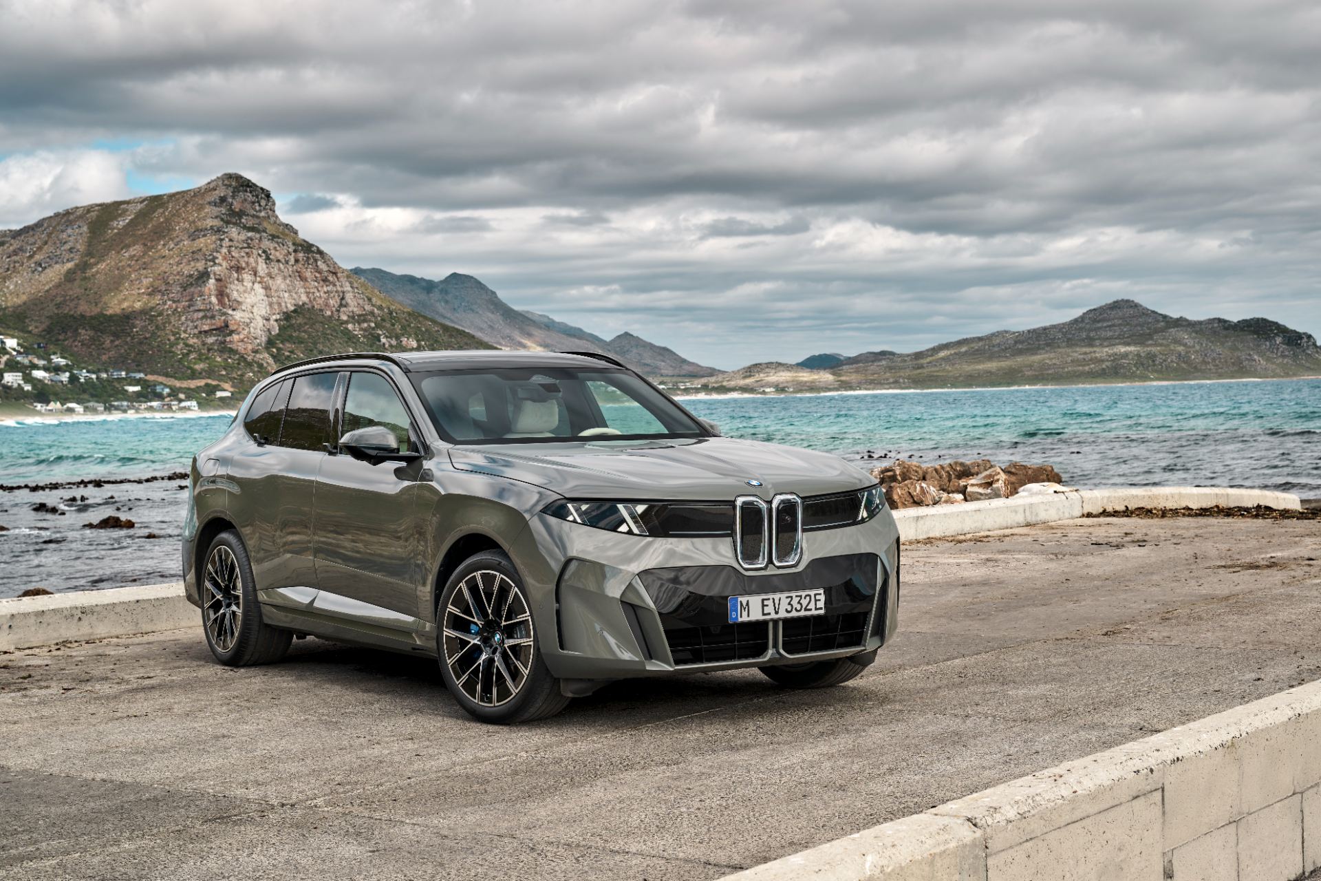 Profile shot on 23-inch M Performance wheels highlighting the 4.99-metre body and longer wheelbase