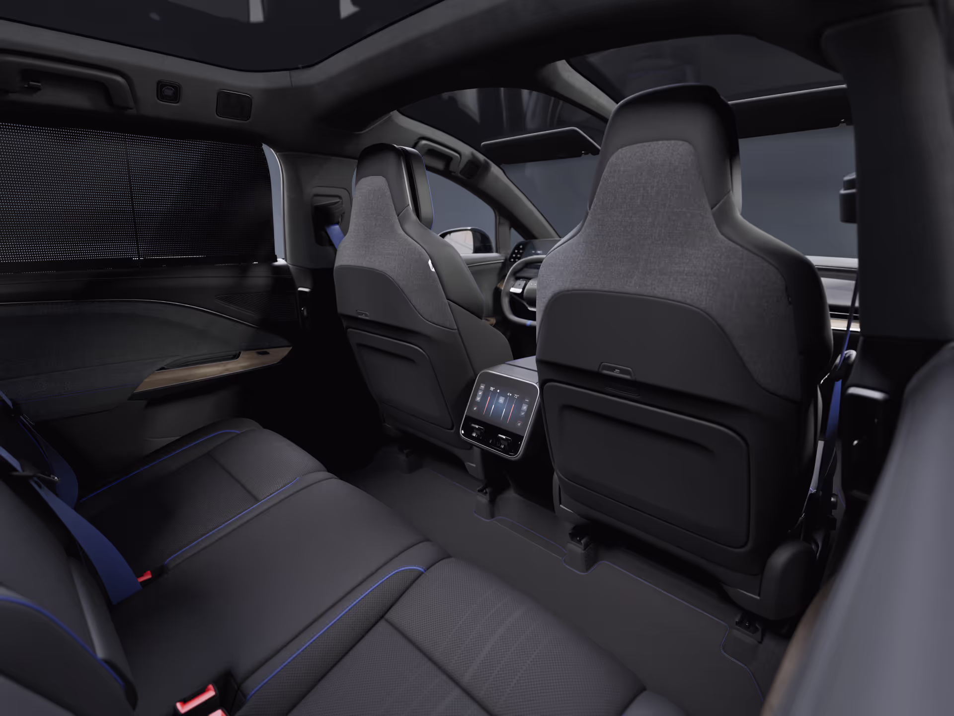 Front centre armrest and door armrest detail with blue contrast stitching