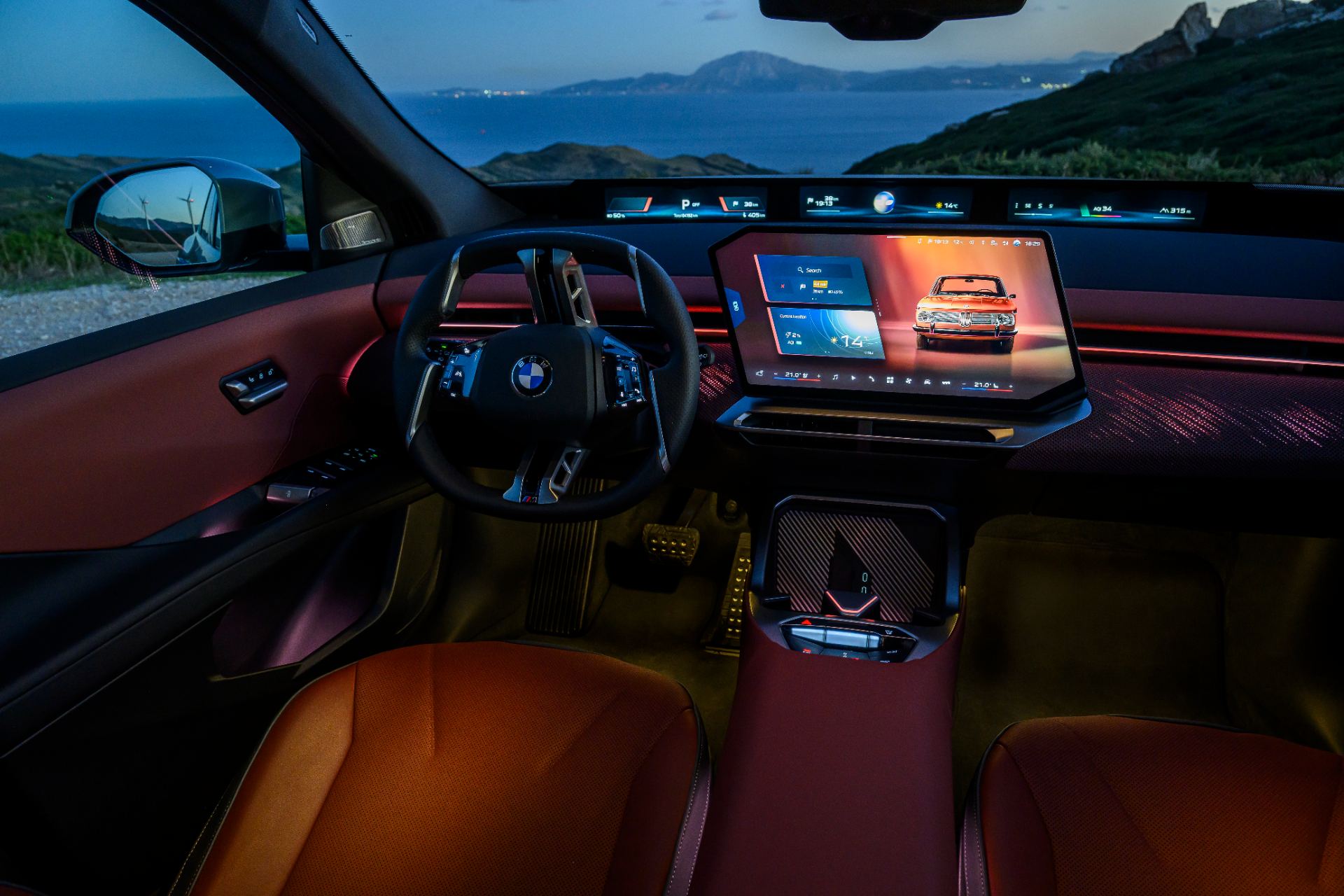 Front seats in perforated Veganza upholstery with the Castanea Contemporary interior theme