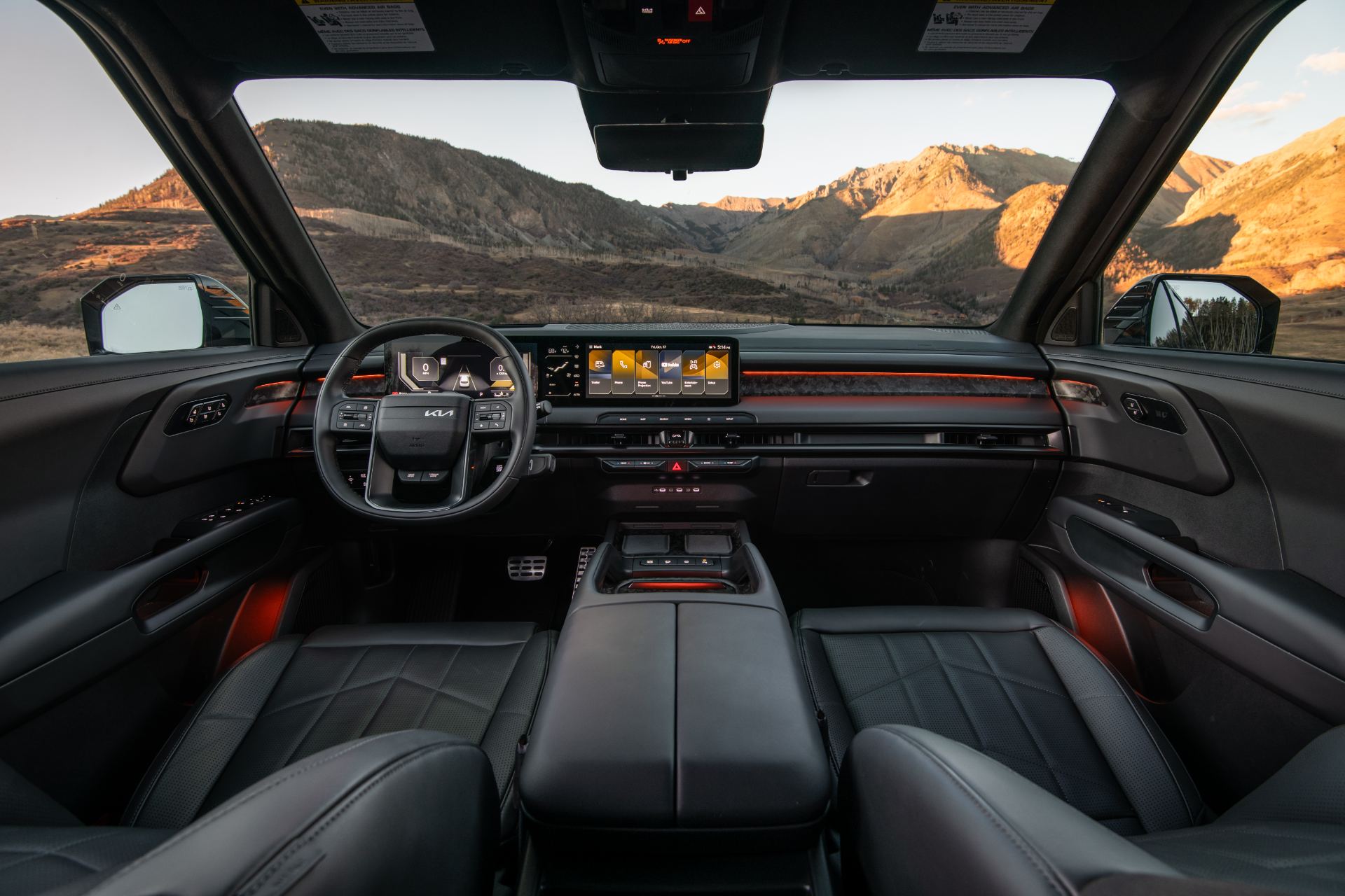 Dashboard and cockpit showing the dual-screen display layout and new steering wheel