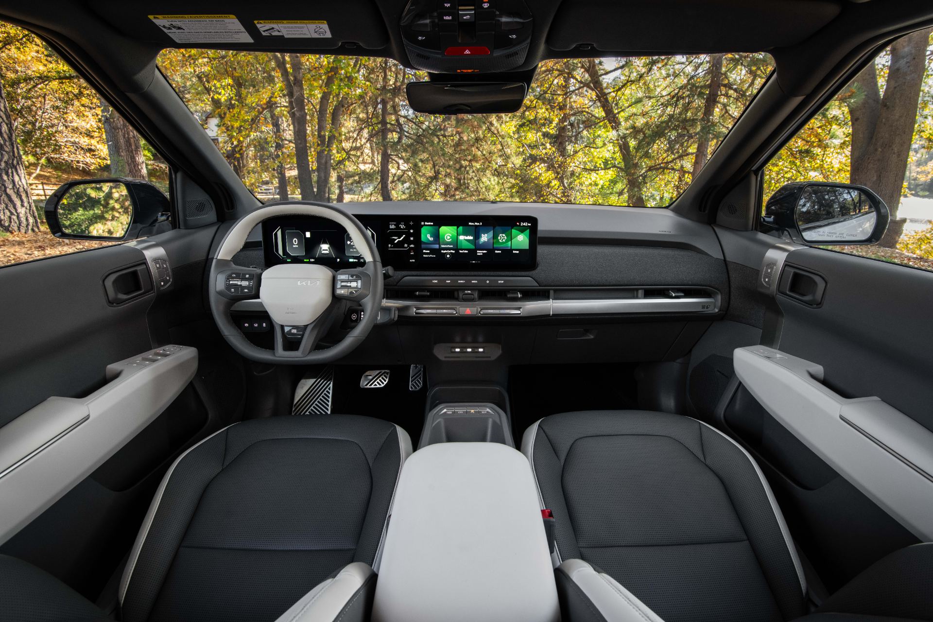 Dashboard and cockpit showing the twin 12.3-inch displays and 5-inch climate screen