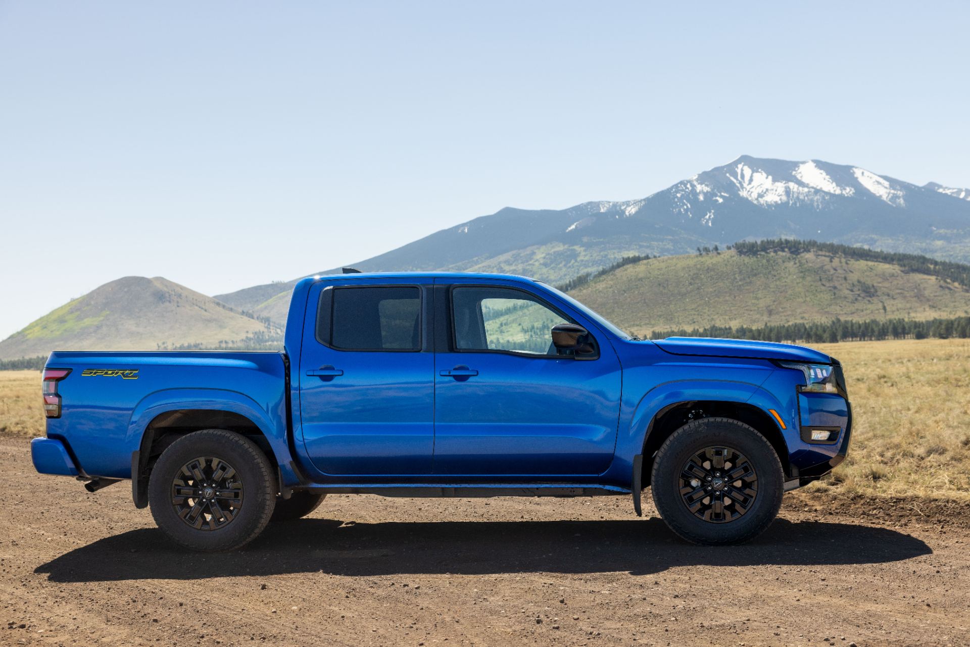Side profile highlighting the 17-inch off-road wheels and all-terrain tyres