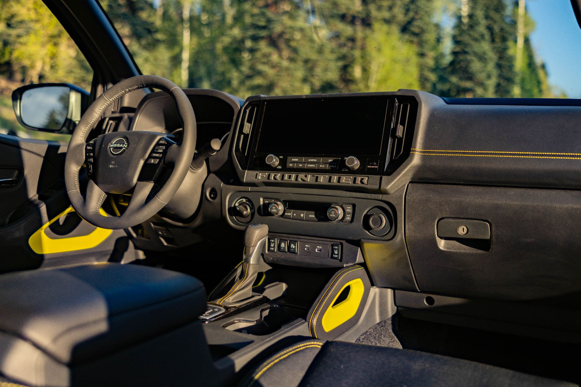 Dashboard and centre stack showing the infotainment display and controls