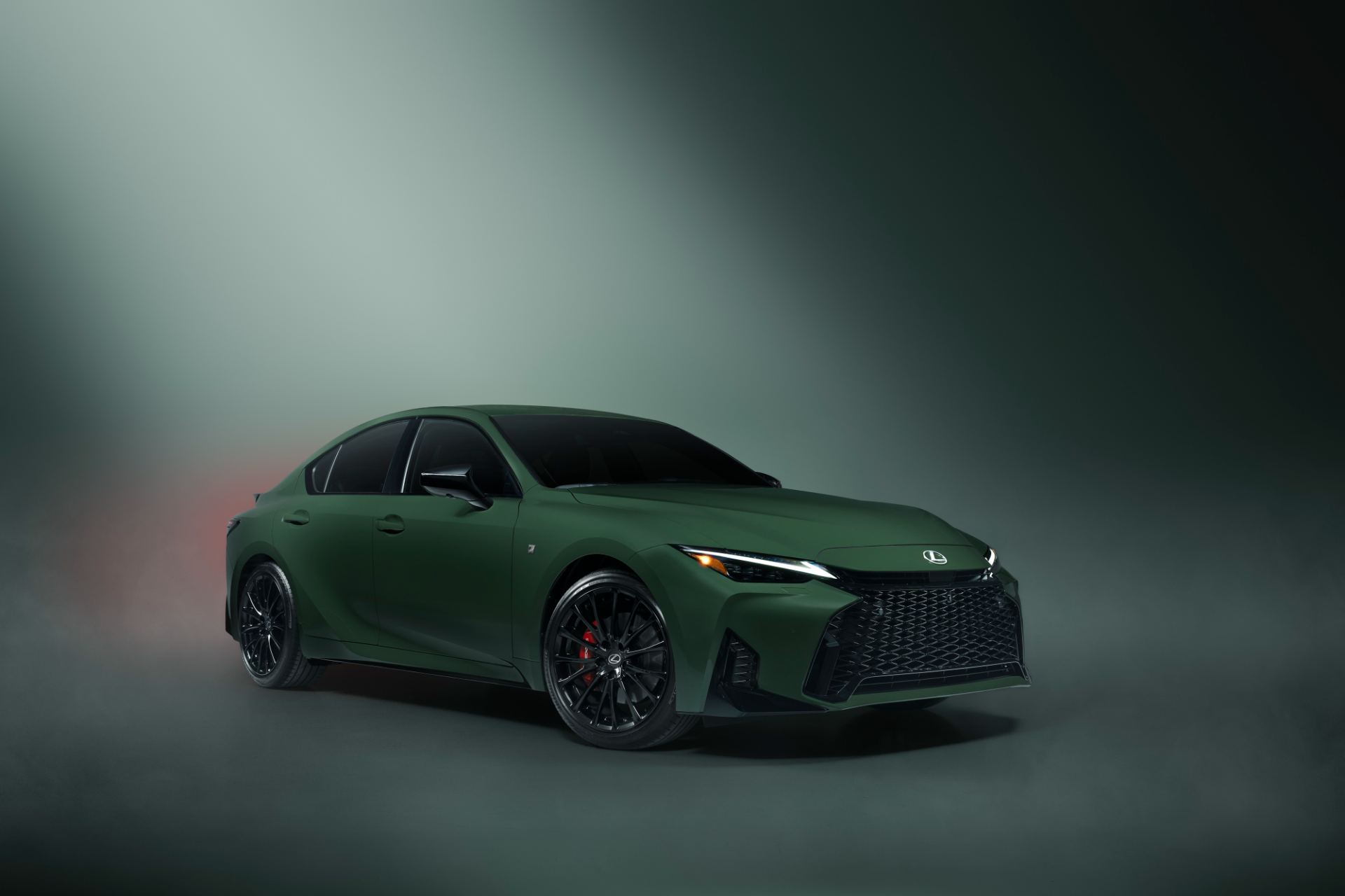 Front three-quarter of the 2027 Lexus IS Special Appearance Package in Envious green on 19-inch black BBS forged wheels, official press photo