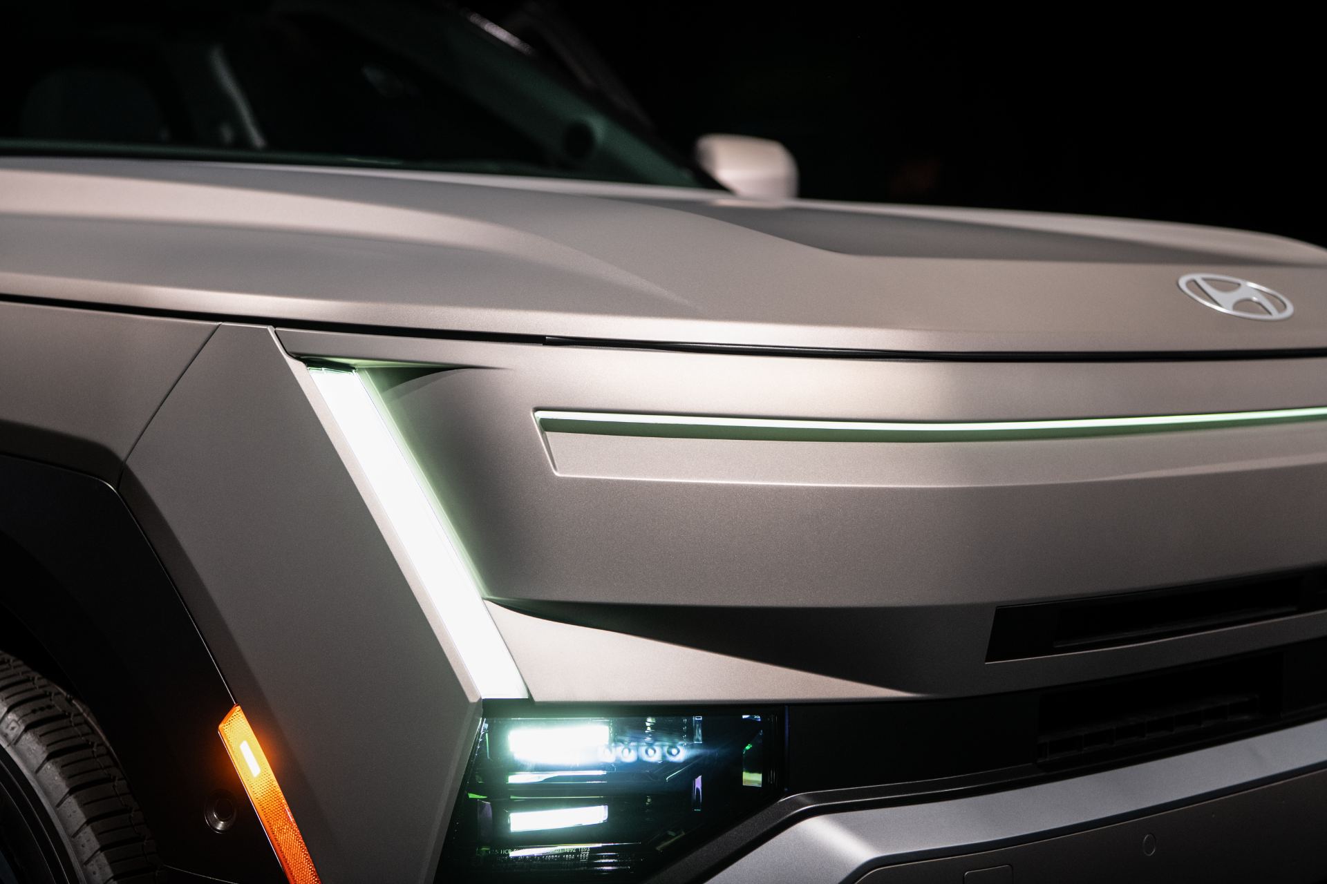 Close detail of the Micro Pixel Lighting headlamp unit illuminated