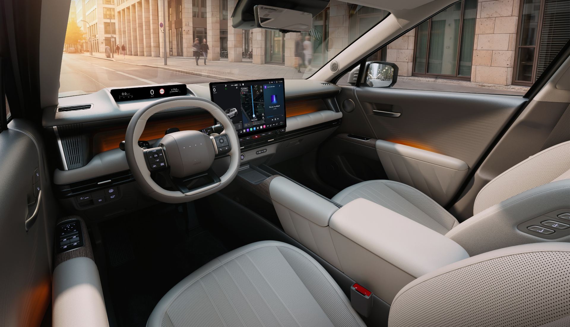 Detail of the Double D-Cut steering wheel and the retained physical climate and audio controls