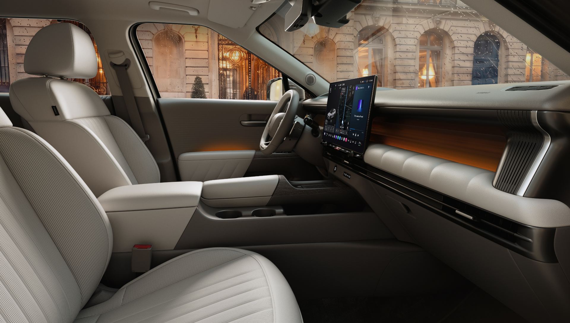 Front seats and centre console with the shift-by-wire lever and twin wireless charging pads